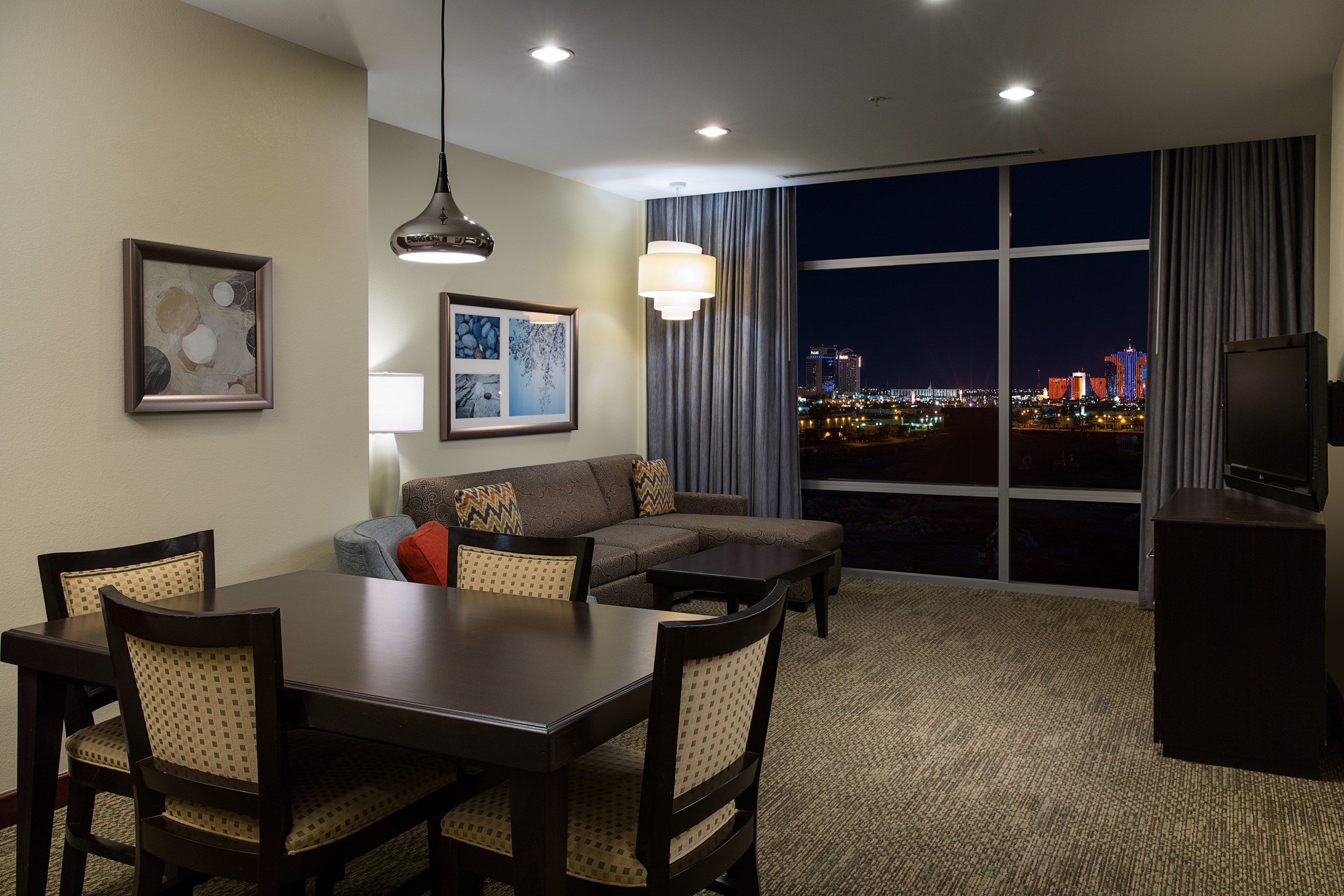 image Share meals and laughs at the dining table and enjoy views of the Strip.