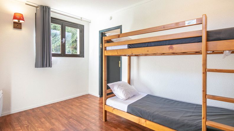 image Drift to sleep in a comfortable bed after a wonderful day outside.