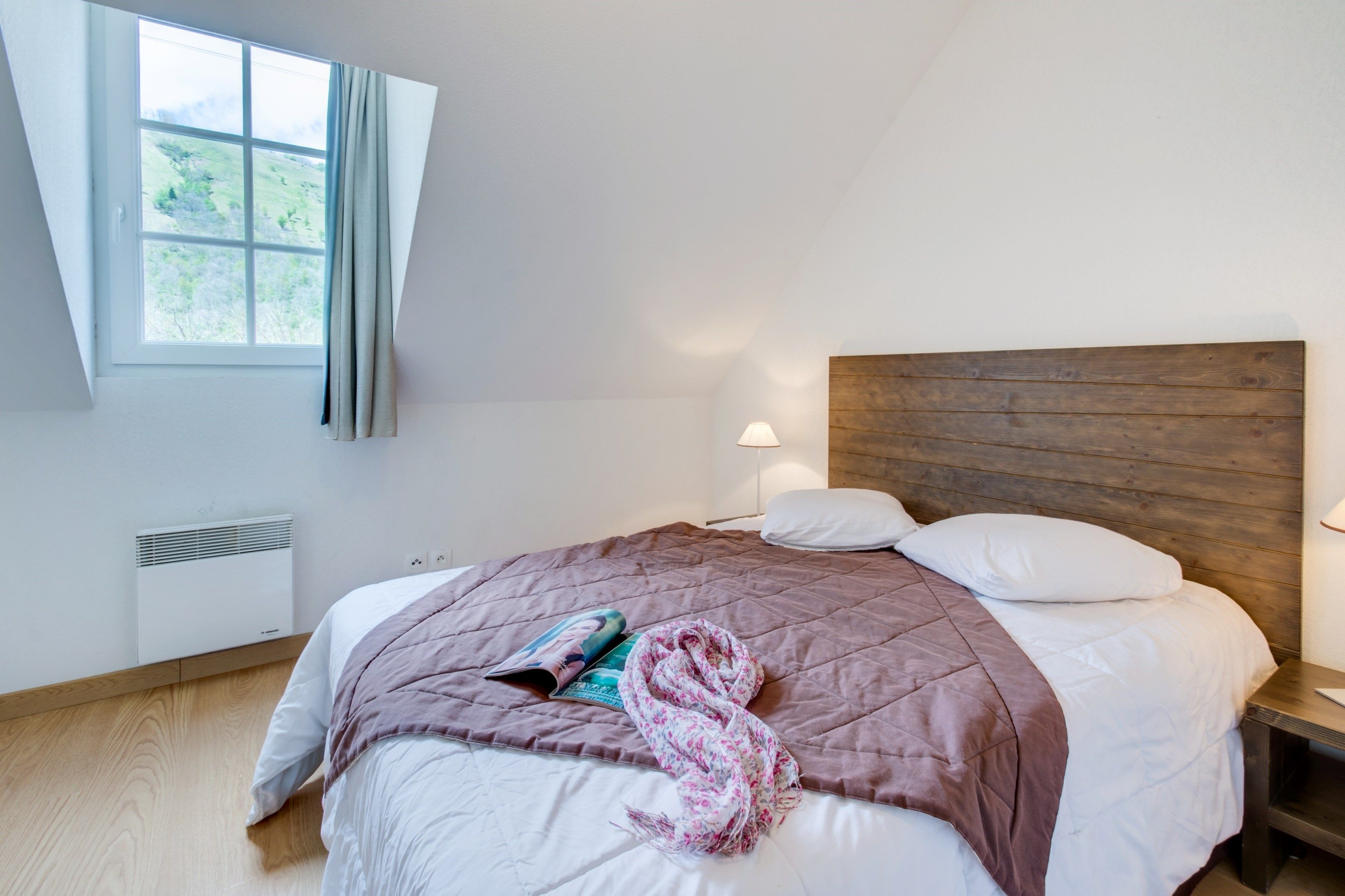 image Drift to sleep in a comfortable bed after a wonderful day outside.