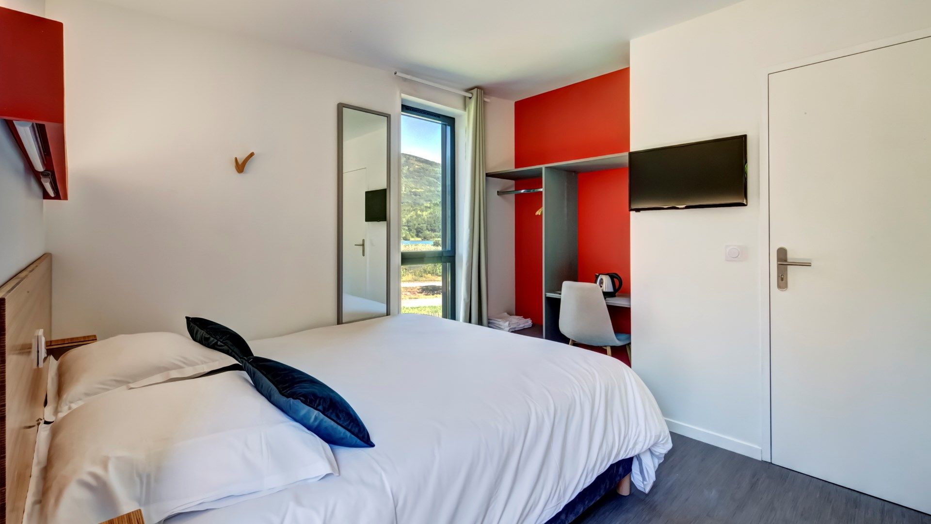 image Relax on the comfy Double bed after a day outside.