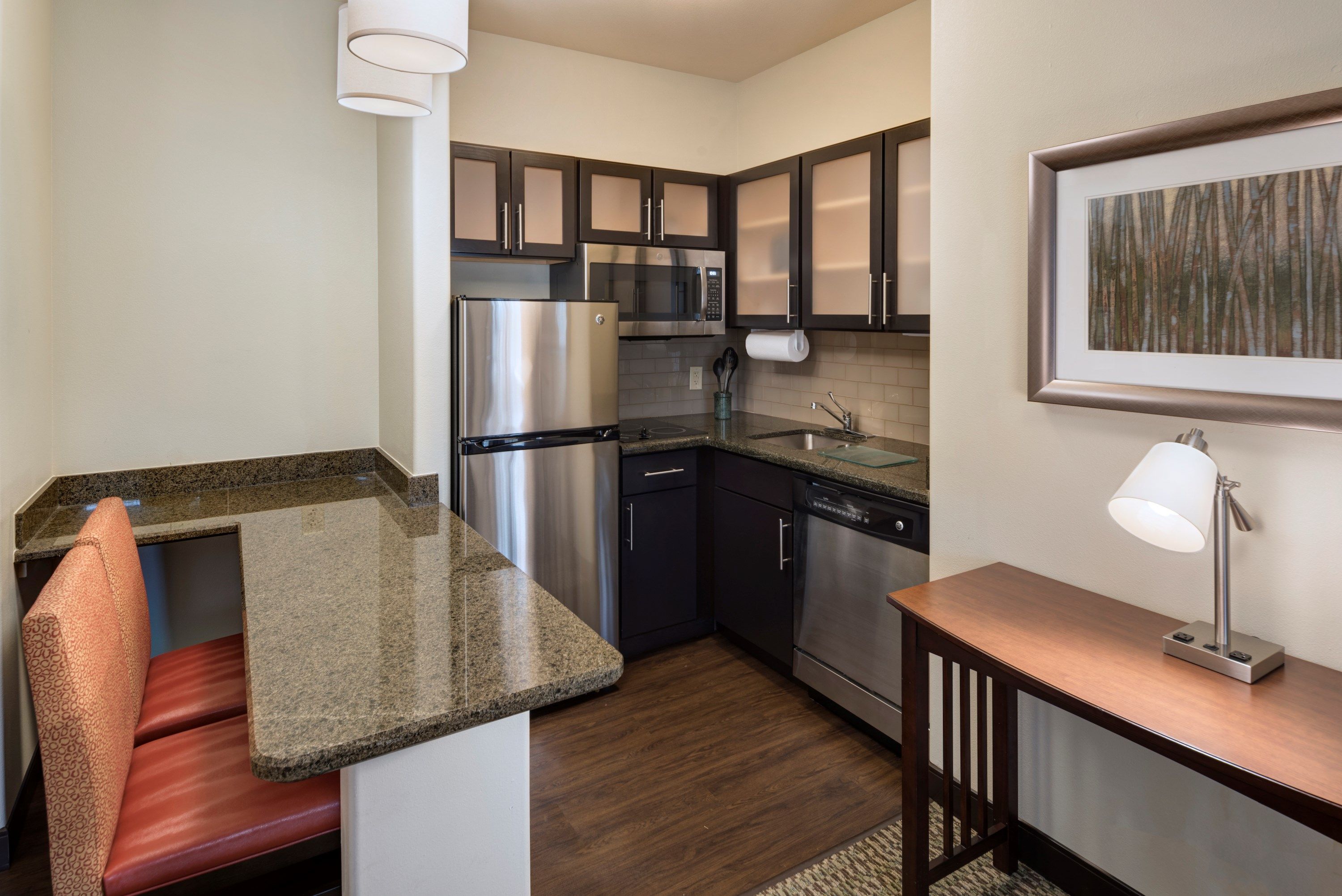 image Curb your appetite by cooking a meal in your kitchen.
