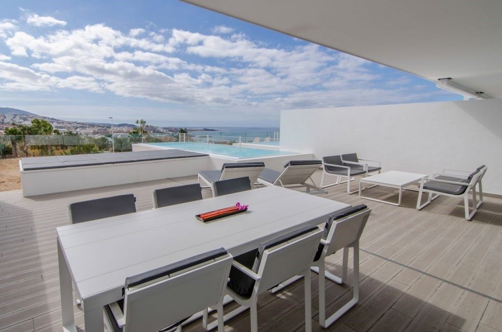 image Soak up the sunshine by your private pool.