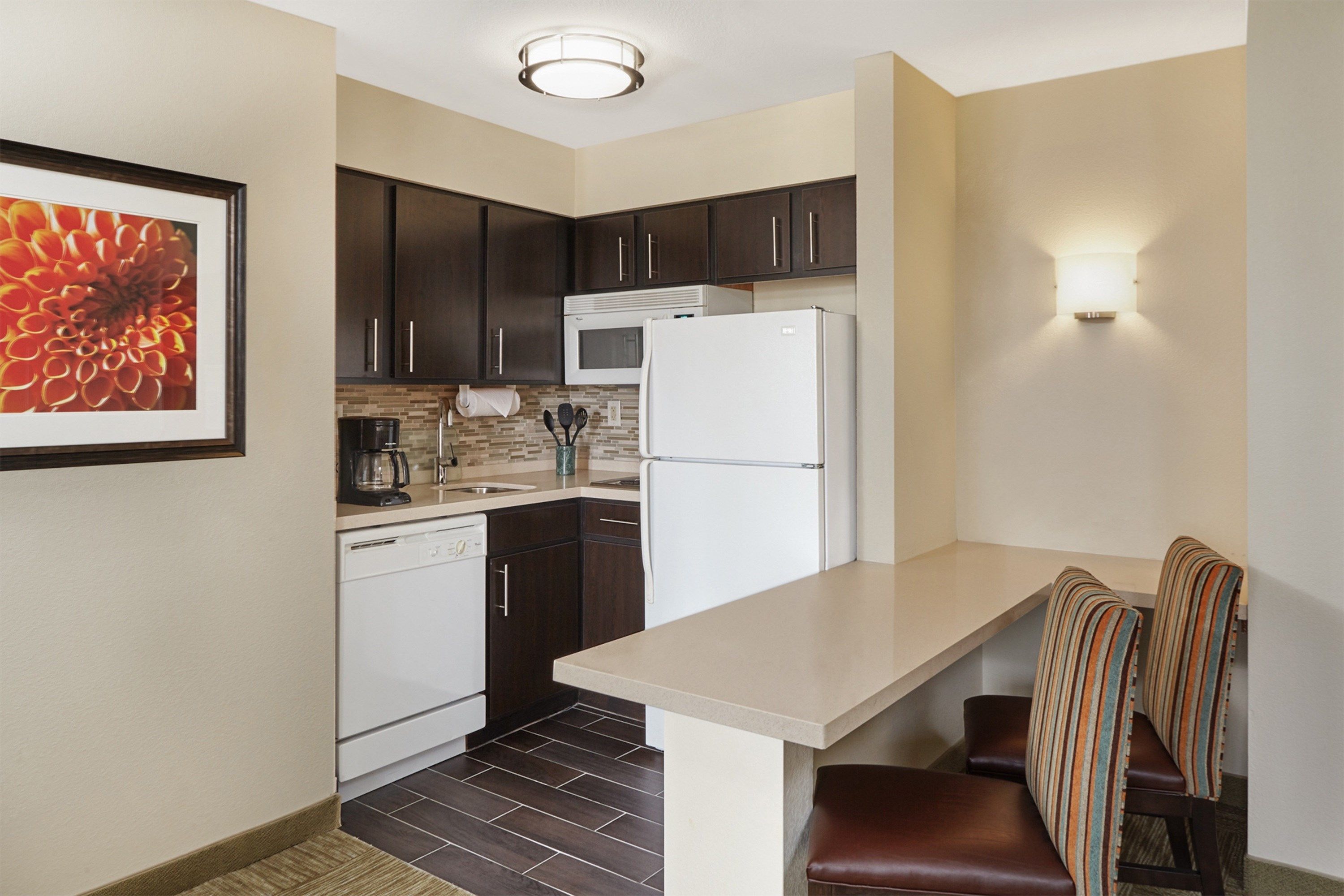 image Settle into the dining area and enjoy a nice meal.