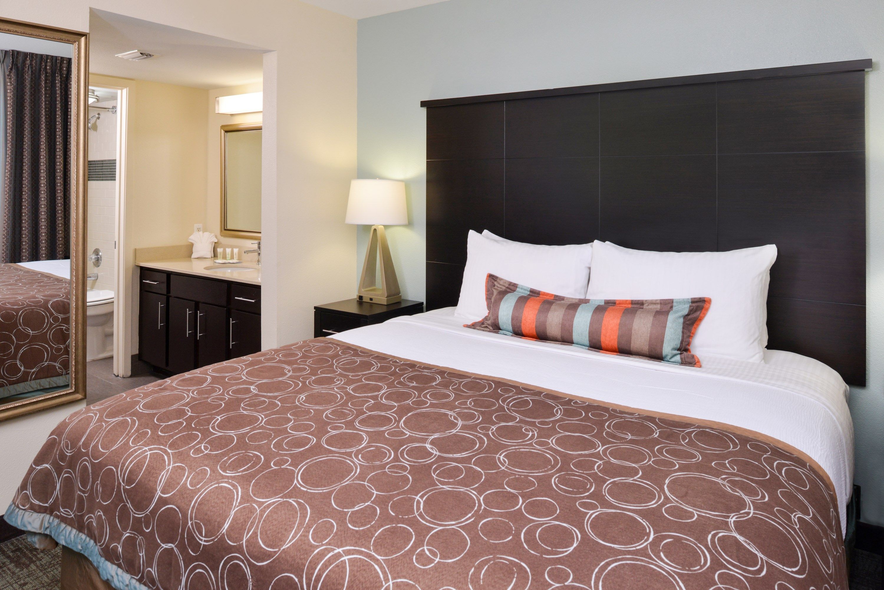 image Drift to sleep in a comfortable bed after a wonderful day outside.