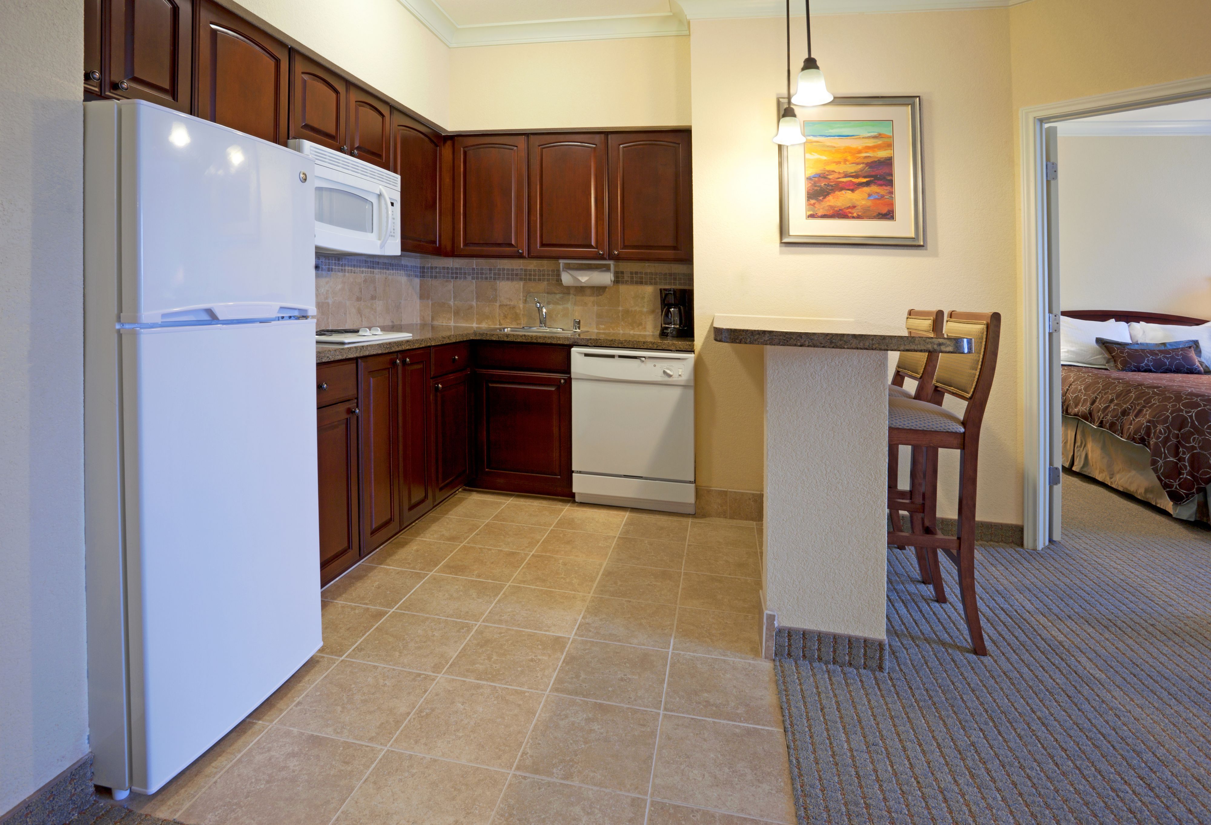 image Well-equipped kitchen with appliances for easy meal preparation.