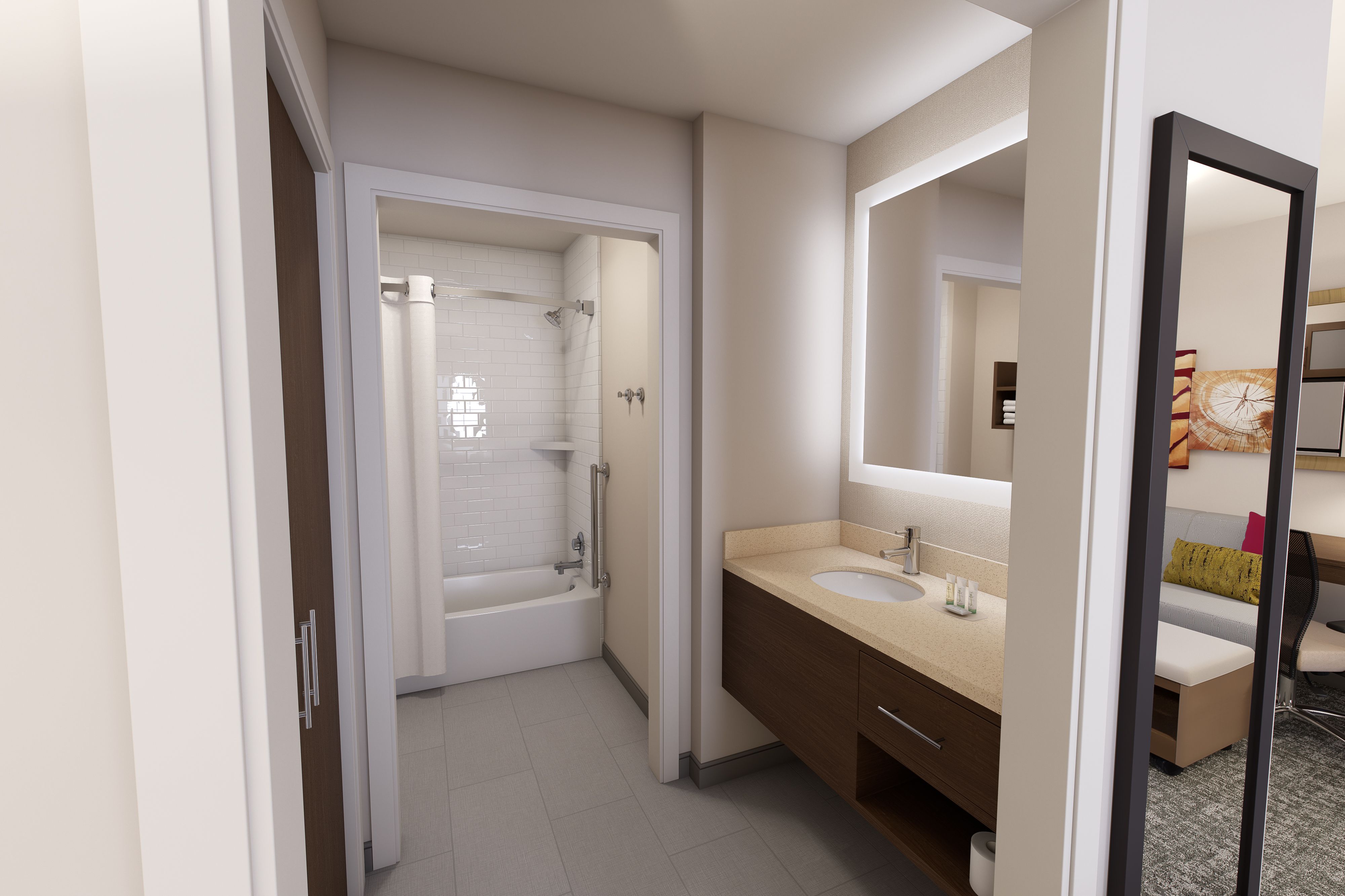 image Unwind in this spacious and modern bathroom, complete with a relaxing tub and sleek fixtures.