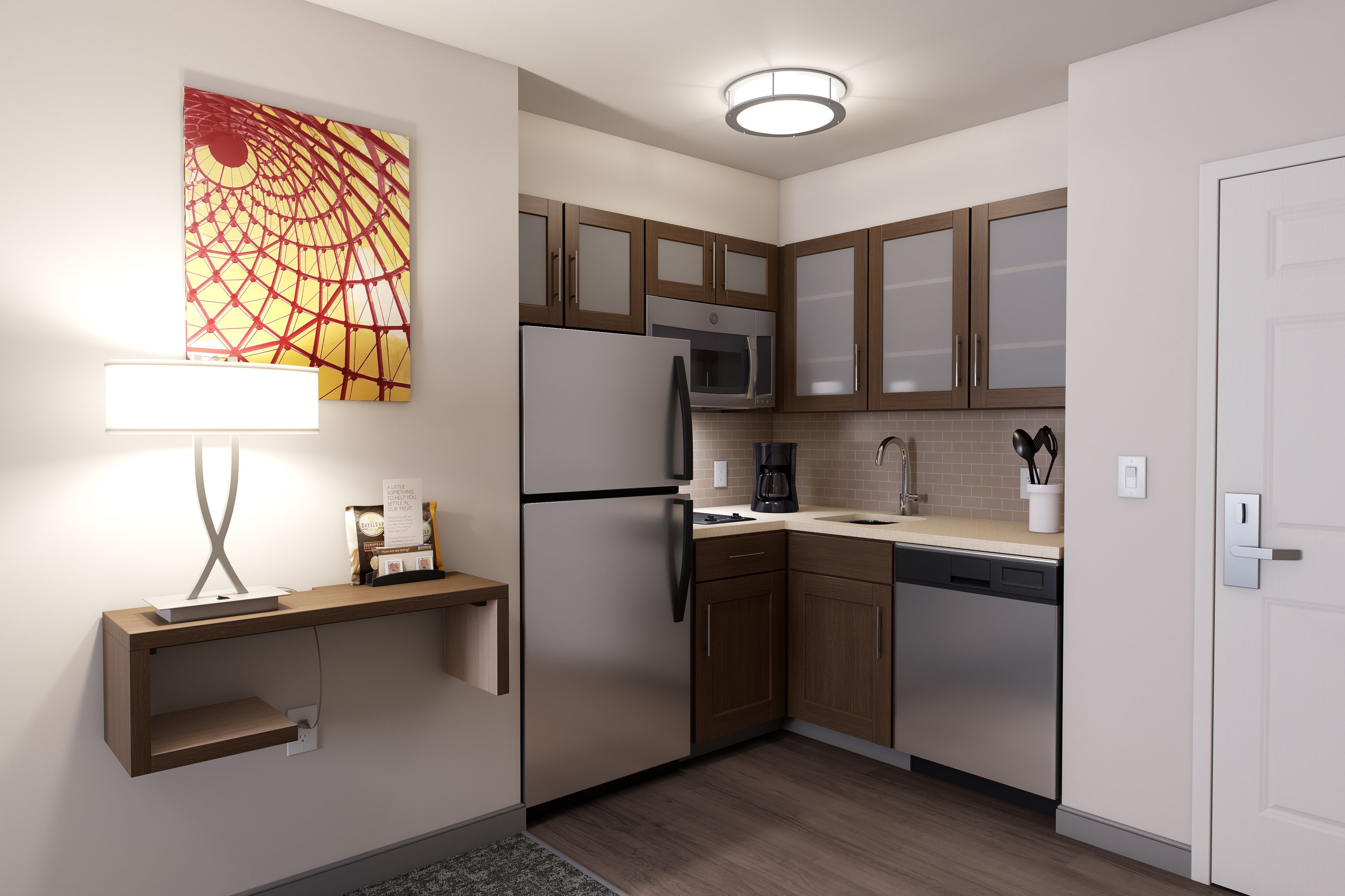 image Create memorable meals in this fully equipped kitchen featuring modern appliances and stylish decor.