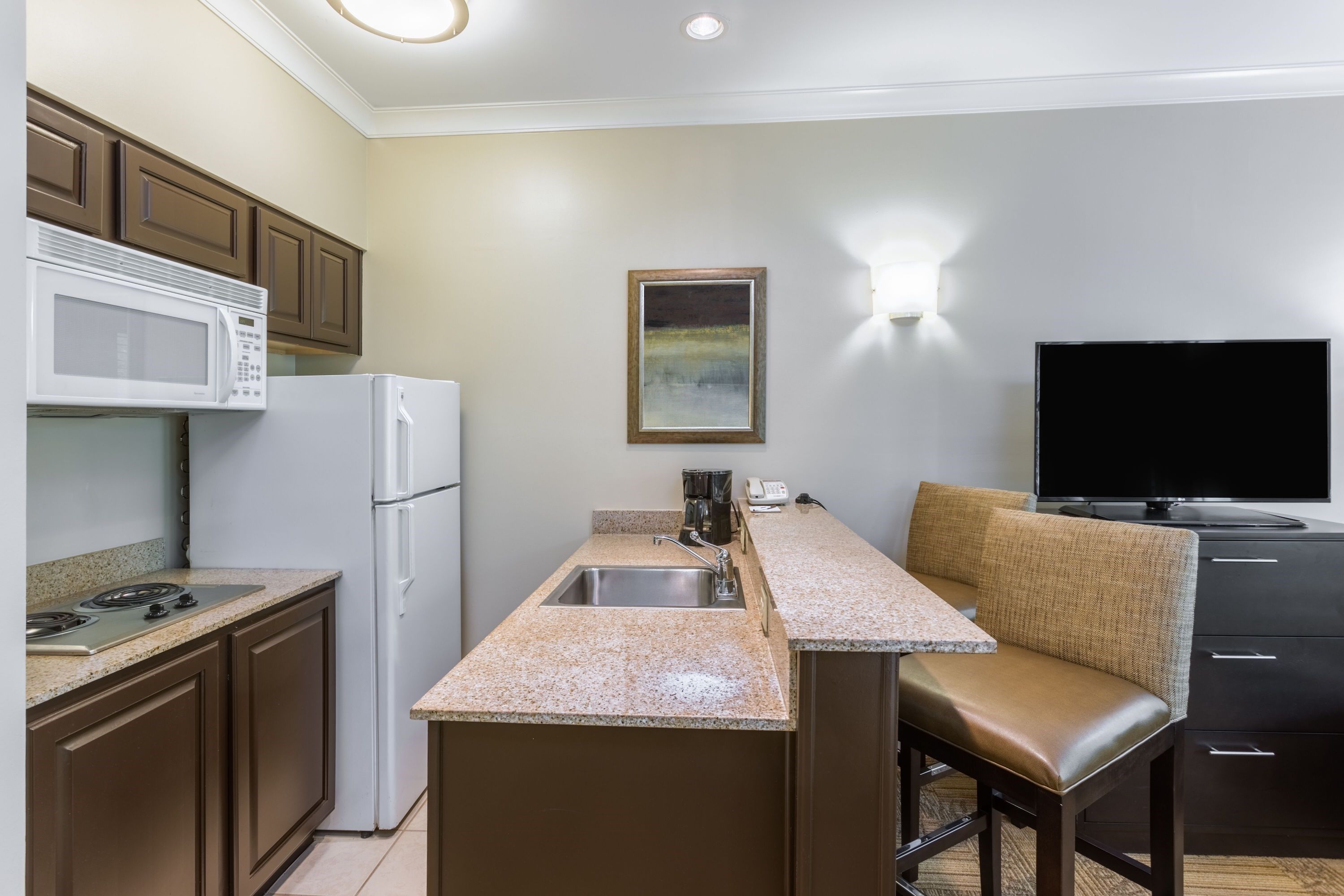 image Prepare meals in the comfort of your very own equipped kitchen.