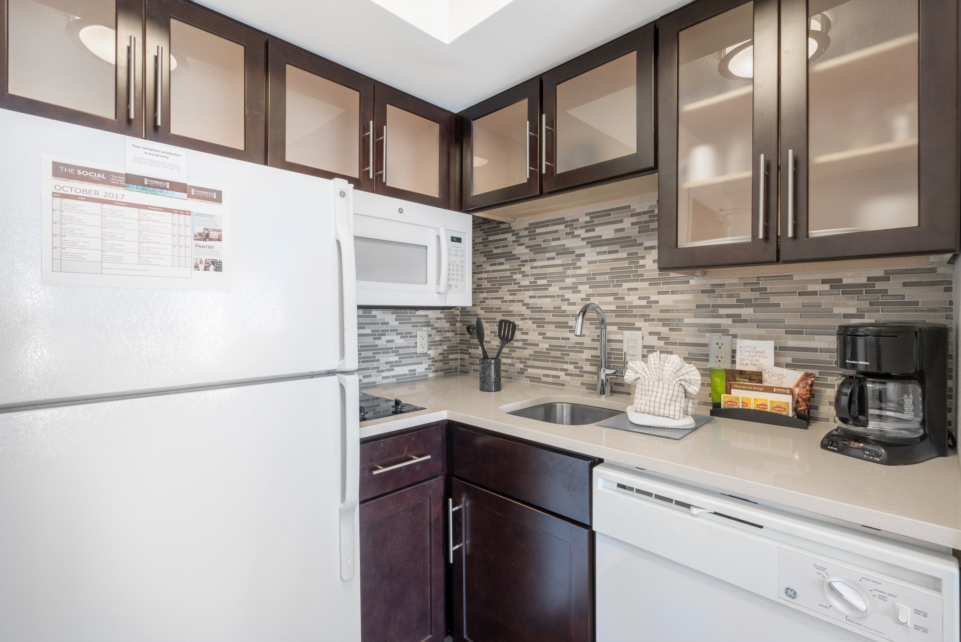 image Curb your appetite by cooking a meal in your kitchen.
