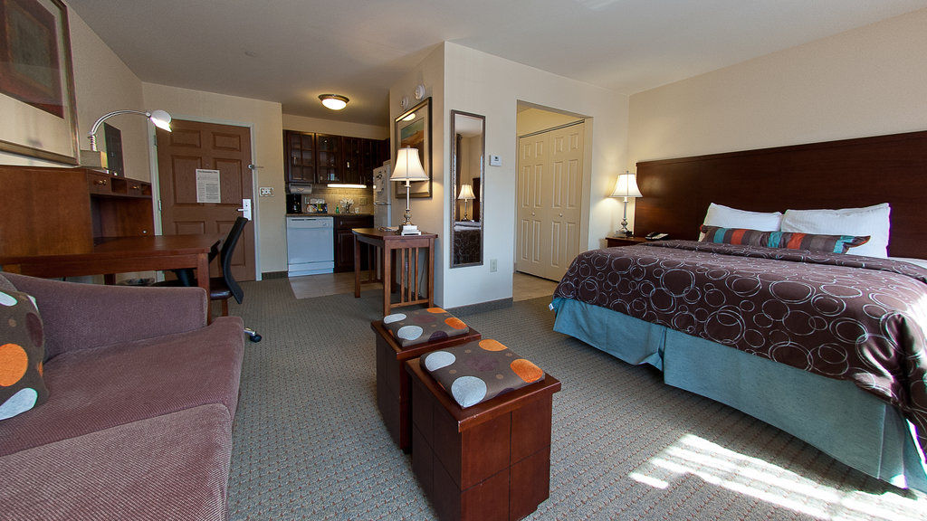 image Enjoy your spacious king studio suite, where comfort meets convenience in every corner.