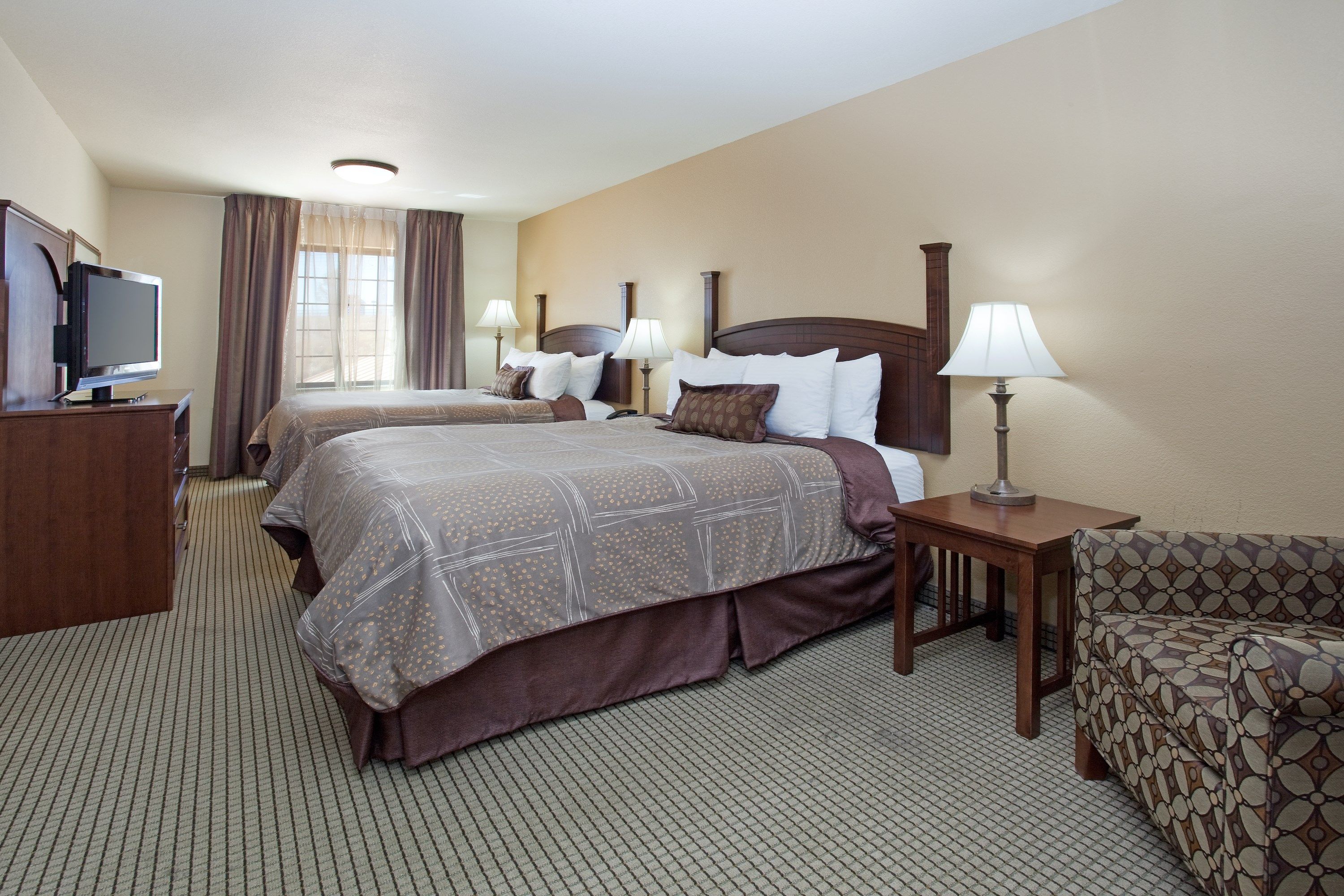 image Drift to sleep in a comfortable bed after a wonderful day outside.