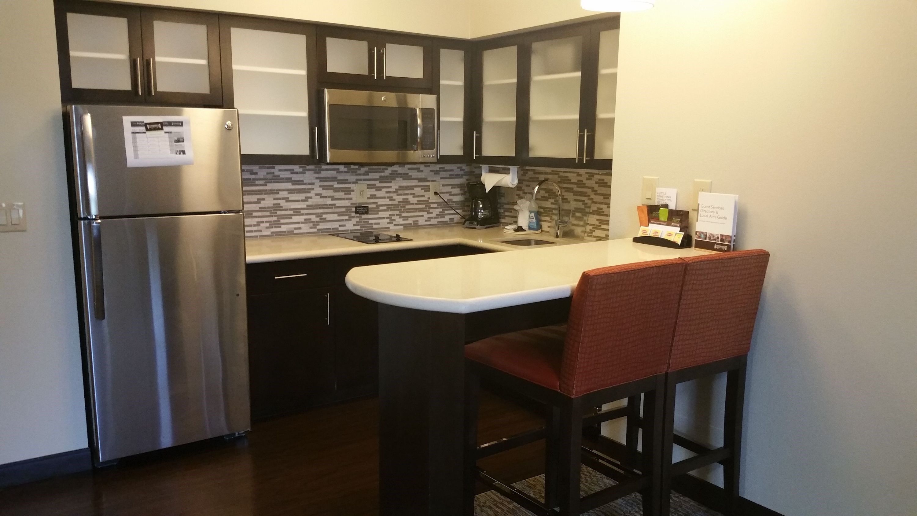 image Curb your appetite by cooking a meal in your kitchen.