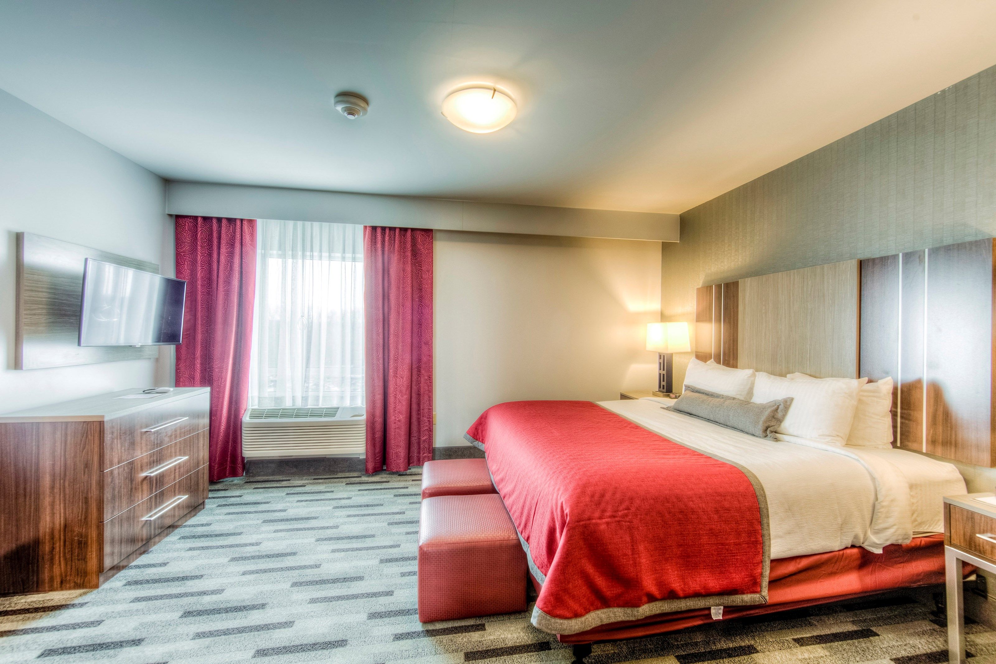 image Drift to sleep in a comfortable bed after a busy day.