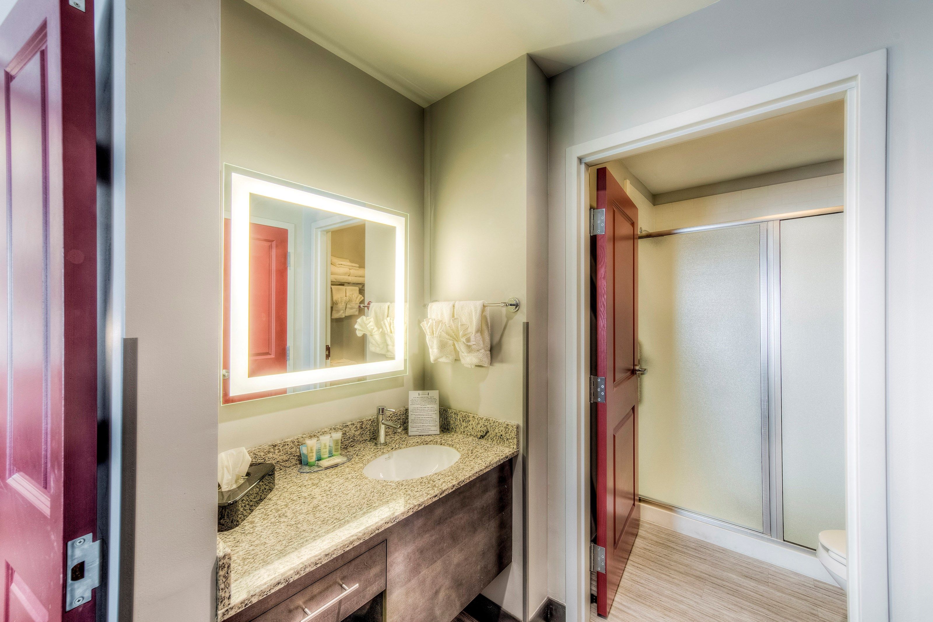 image Get ready for the day in the modern and bright bathroom.