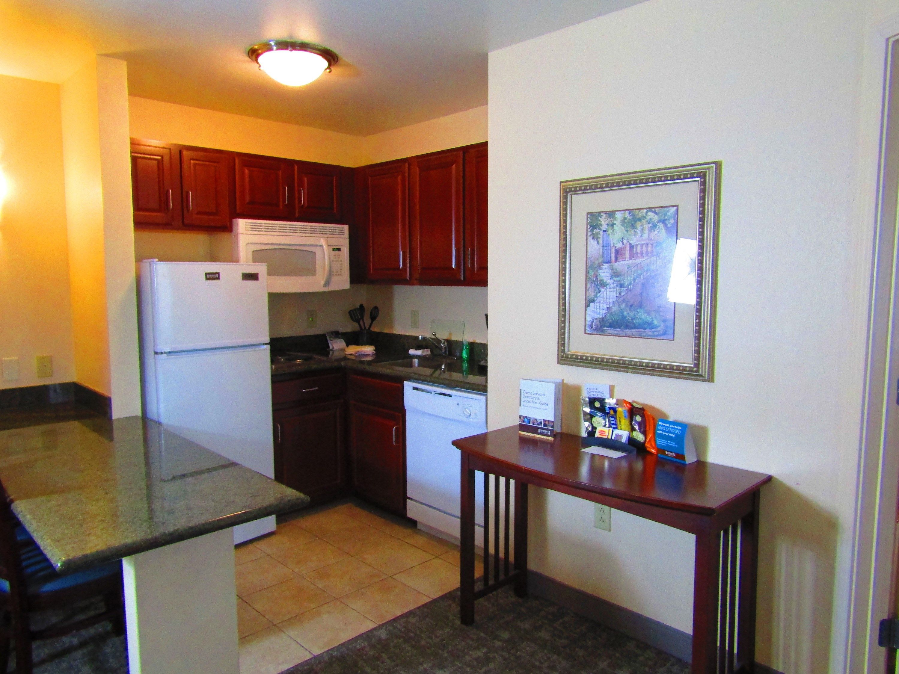 image Curb your appetite by cooking a meal in your kitchen.