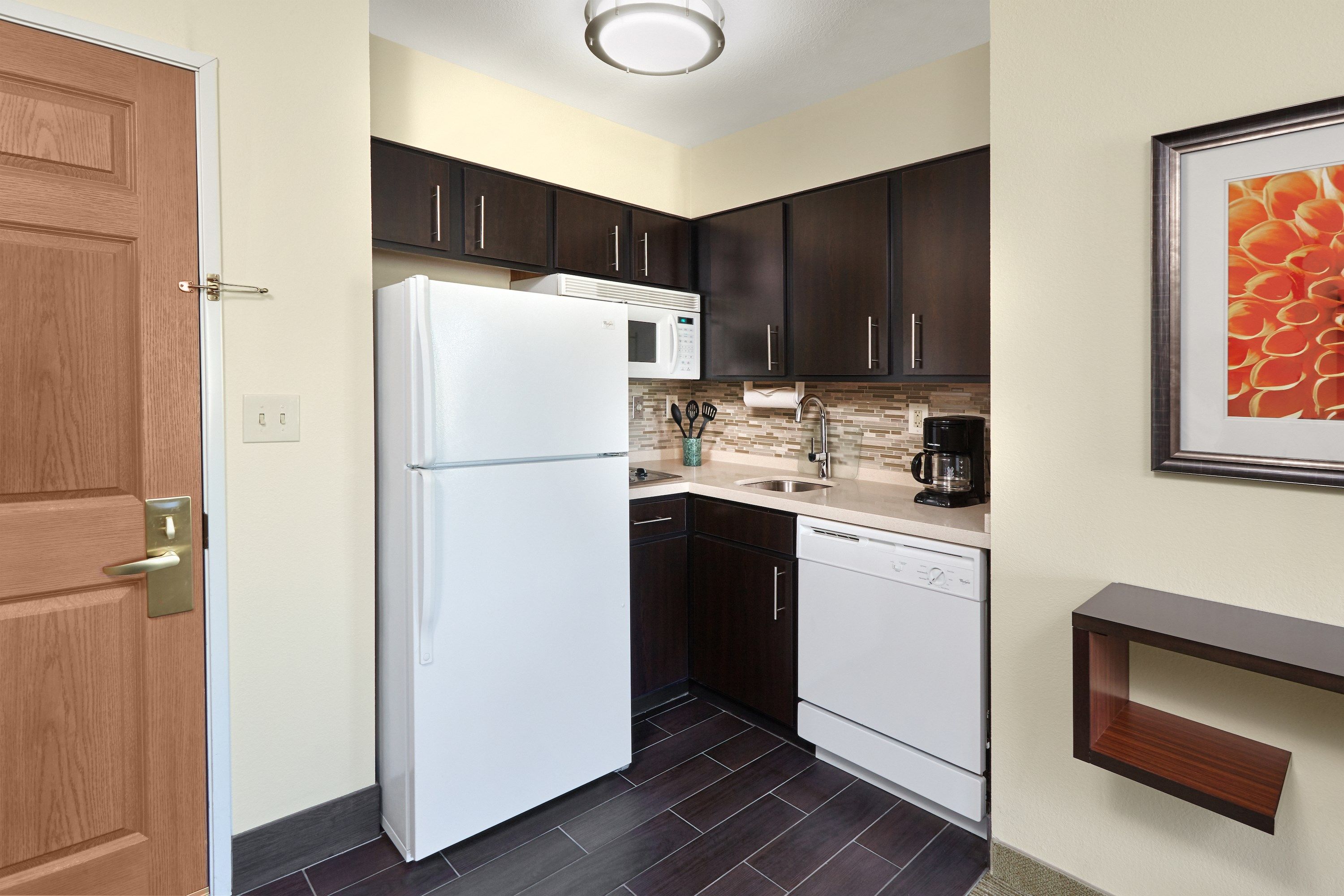 image Curb your appetite by cooking a meal in your kitchen.