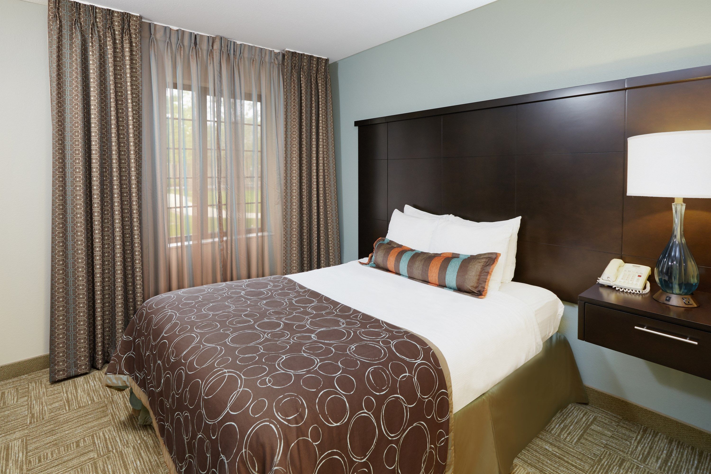 image Get a peaceful night sleep in our cozy master bedroom which has 1 Queen bed.