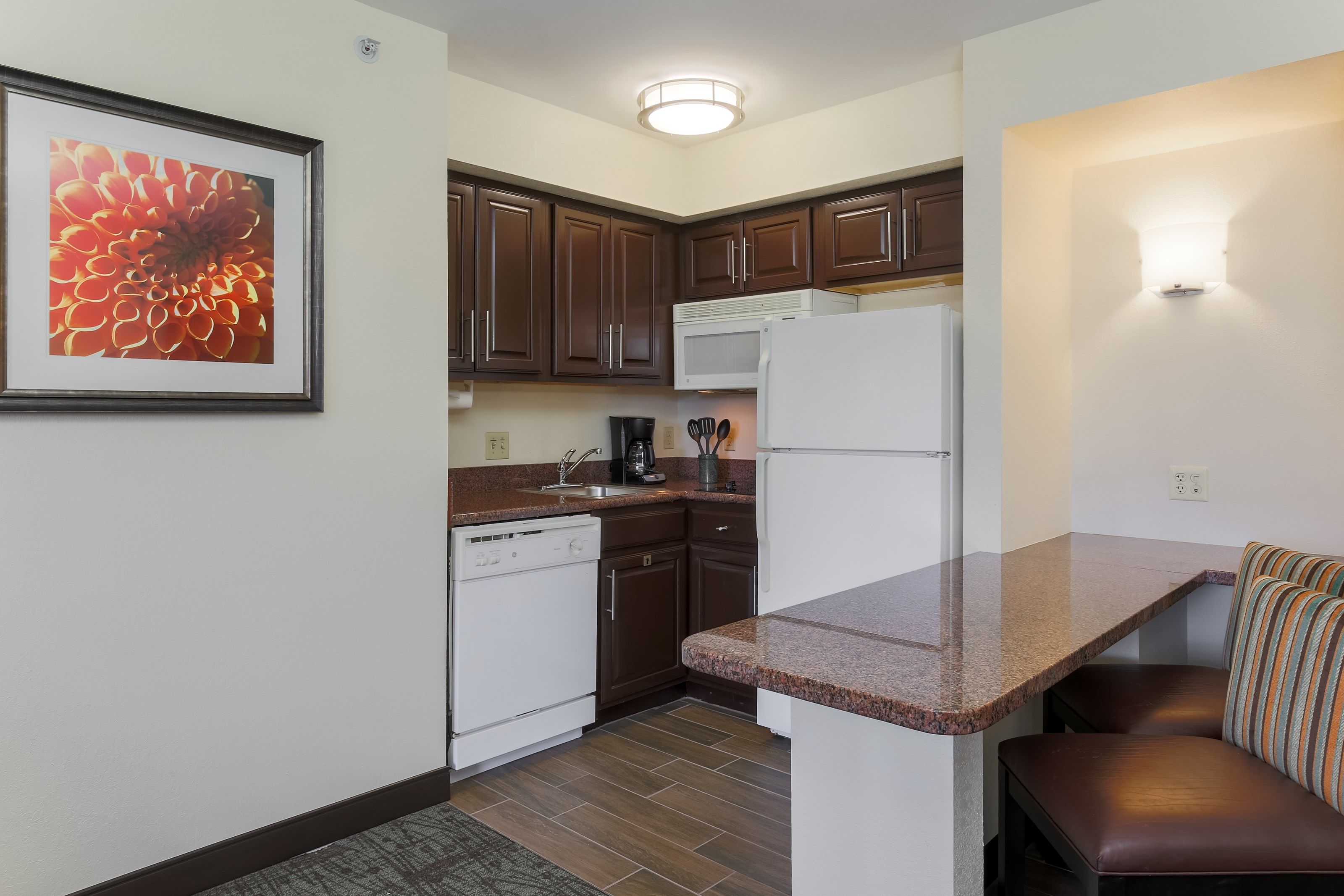 image Curb your appetite by cooking a meal in your kitchen.