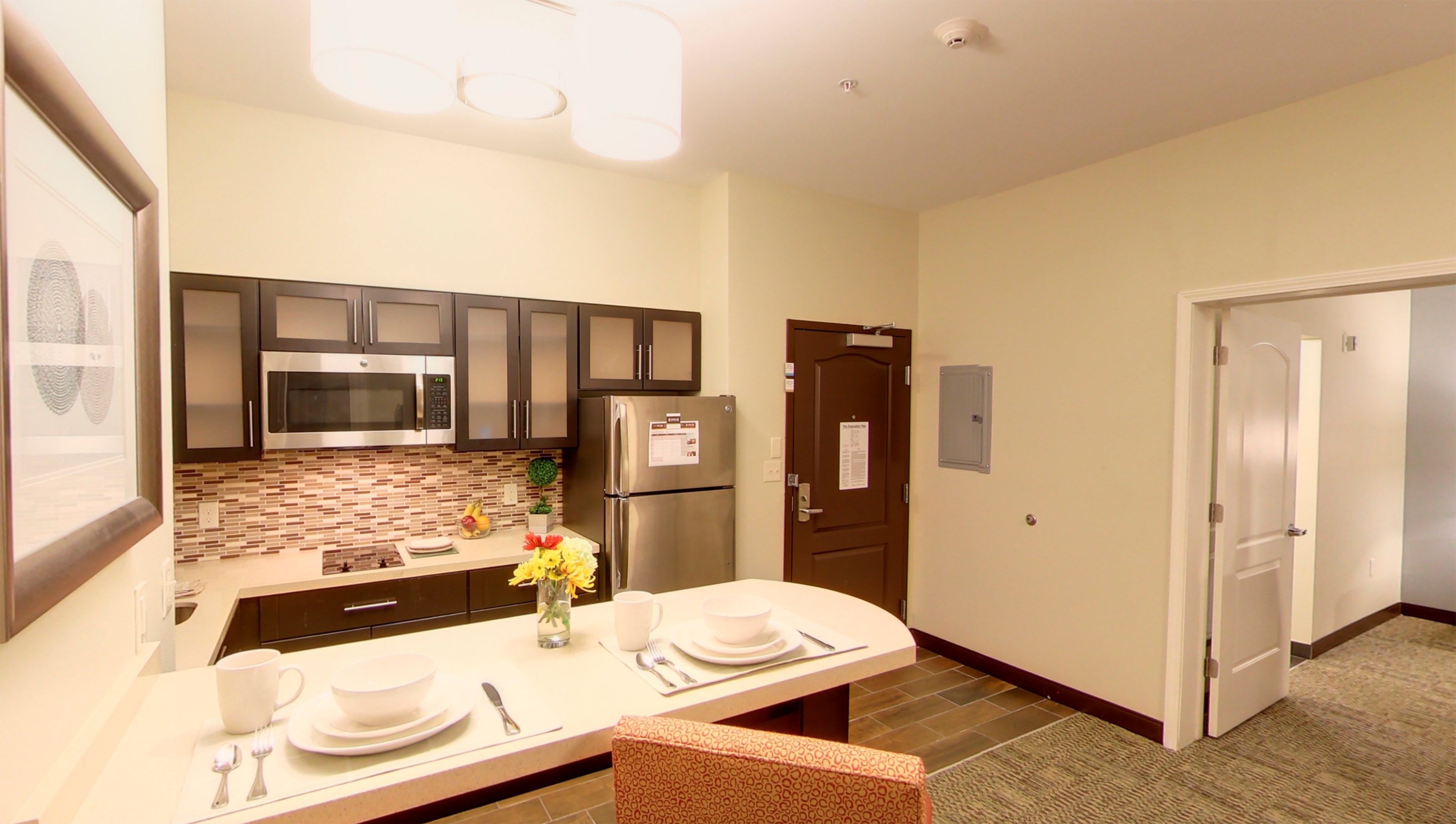 image Prepare a delicious meal in your fully-equipped kitchen and enjoy your food at the dining table.