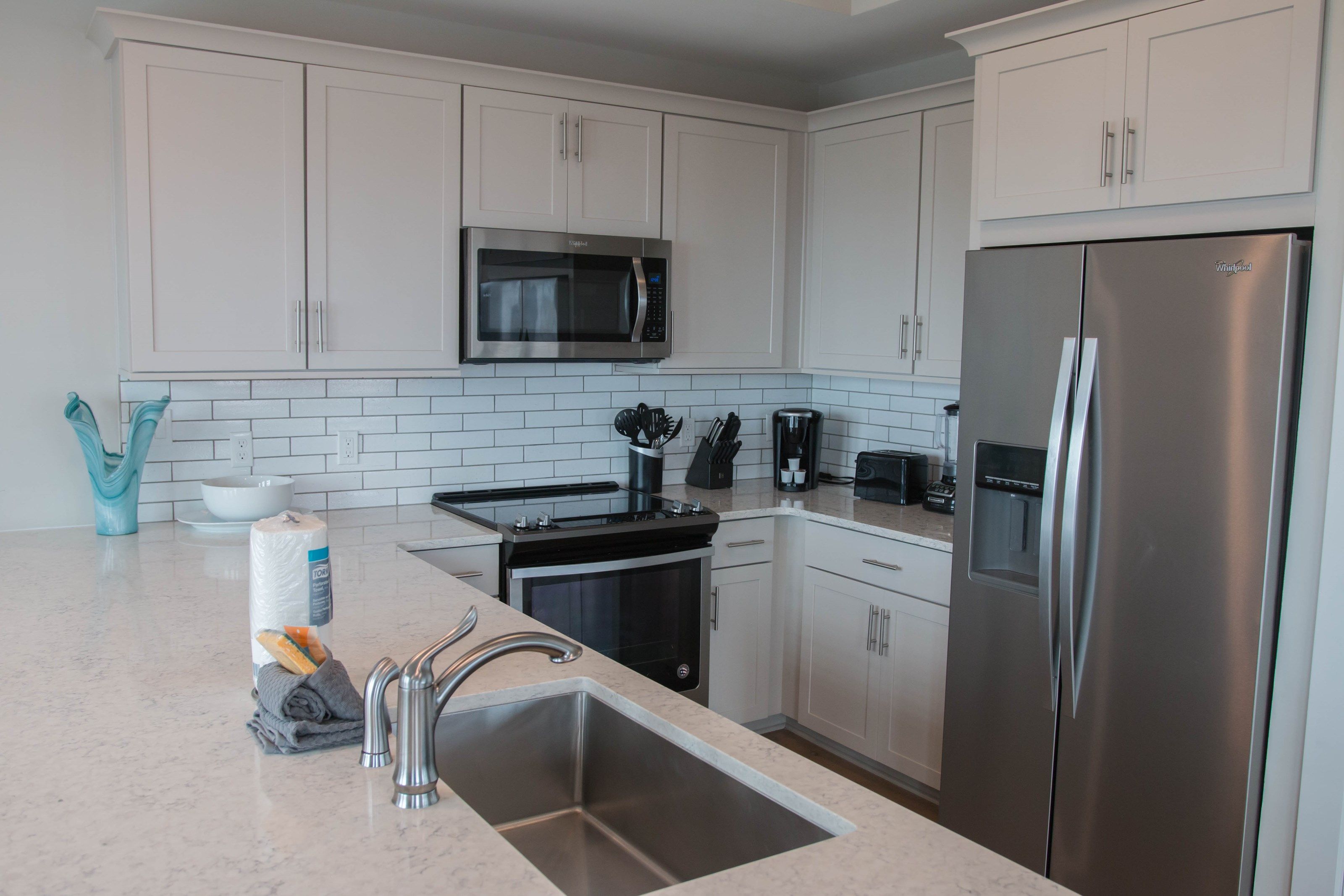 image Curb your appetite by cooking a meal in your kitchen.