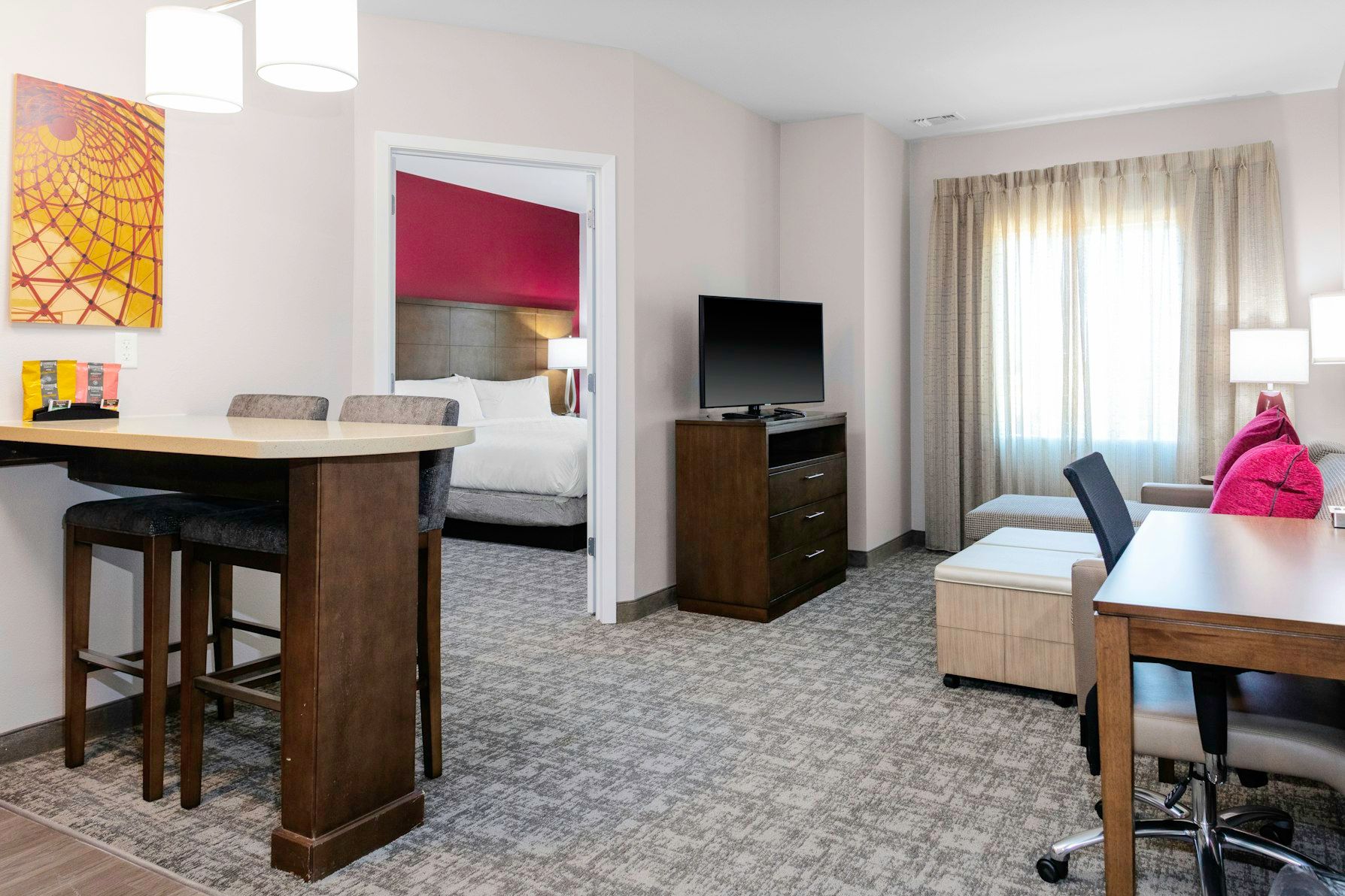 image The inviting living space seamlessly connects to a restful sleeping area, ensuring comfort for everyone.