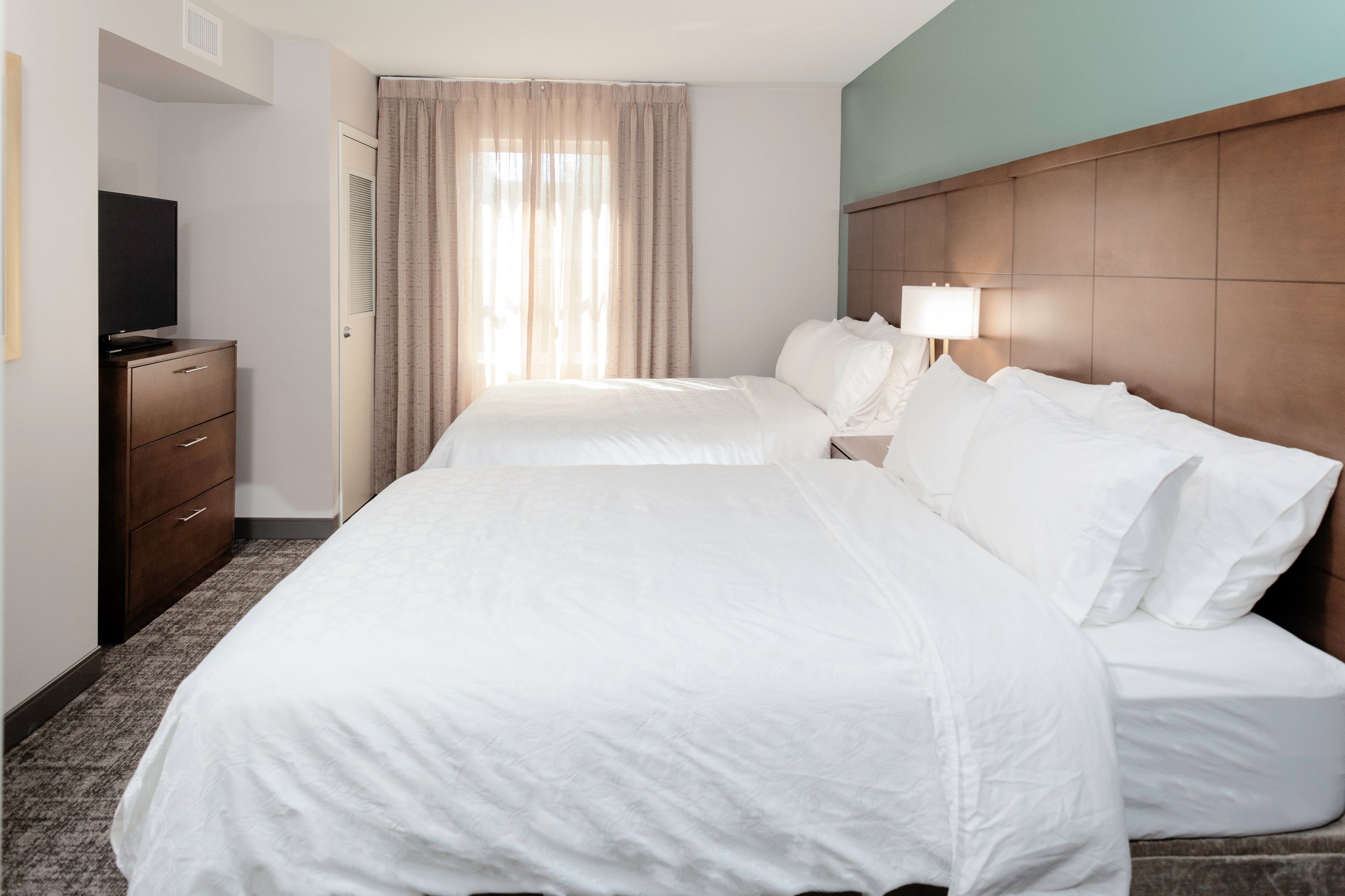 image Drift to sleep in a comfortable bed after a wonderful day outside.