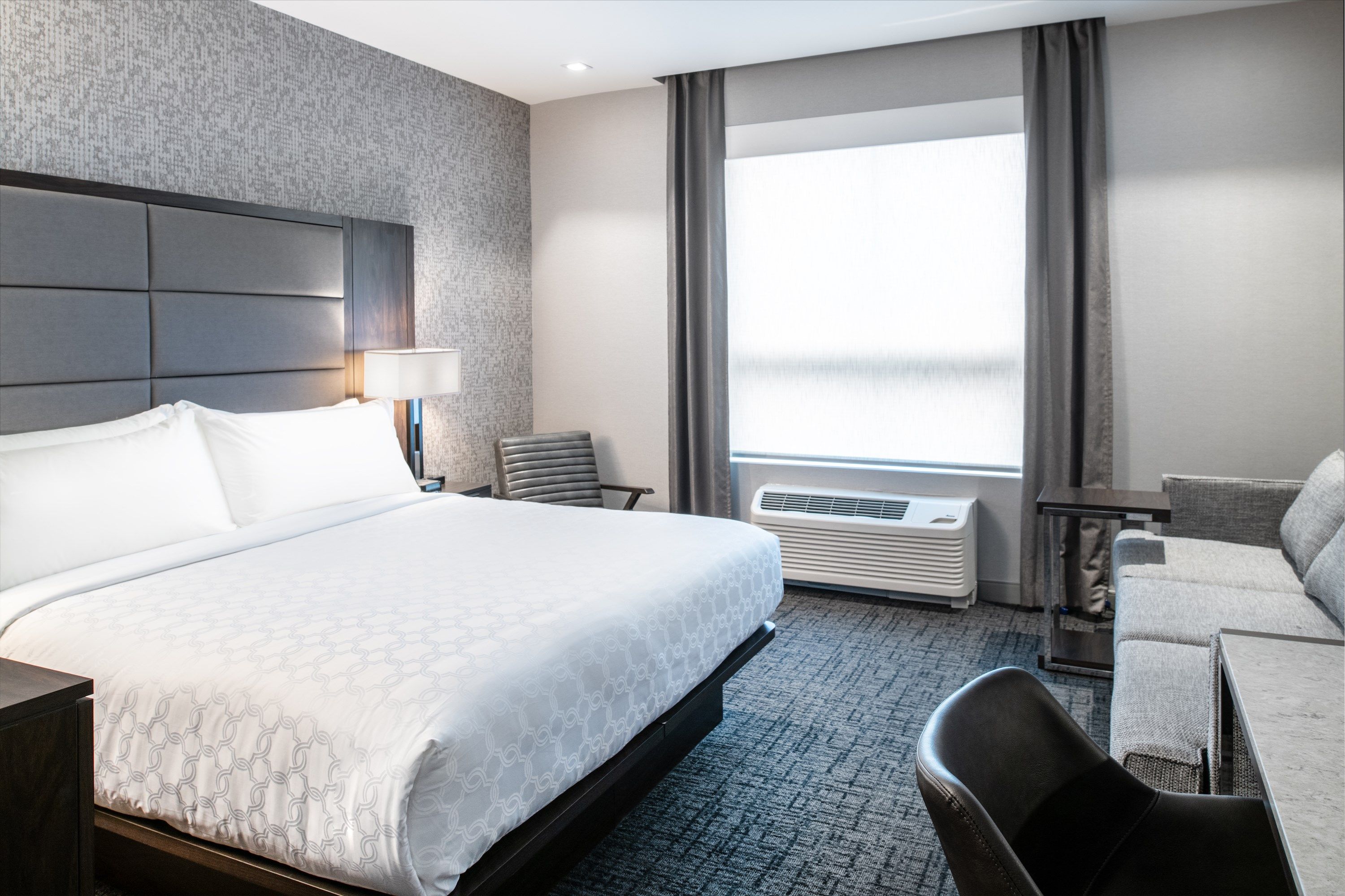 image Drift to sleep in a comfortable bed after a wonderful day outside.