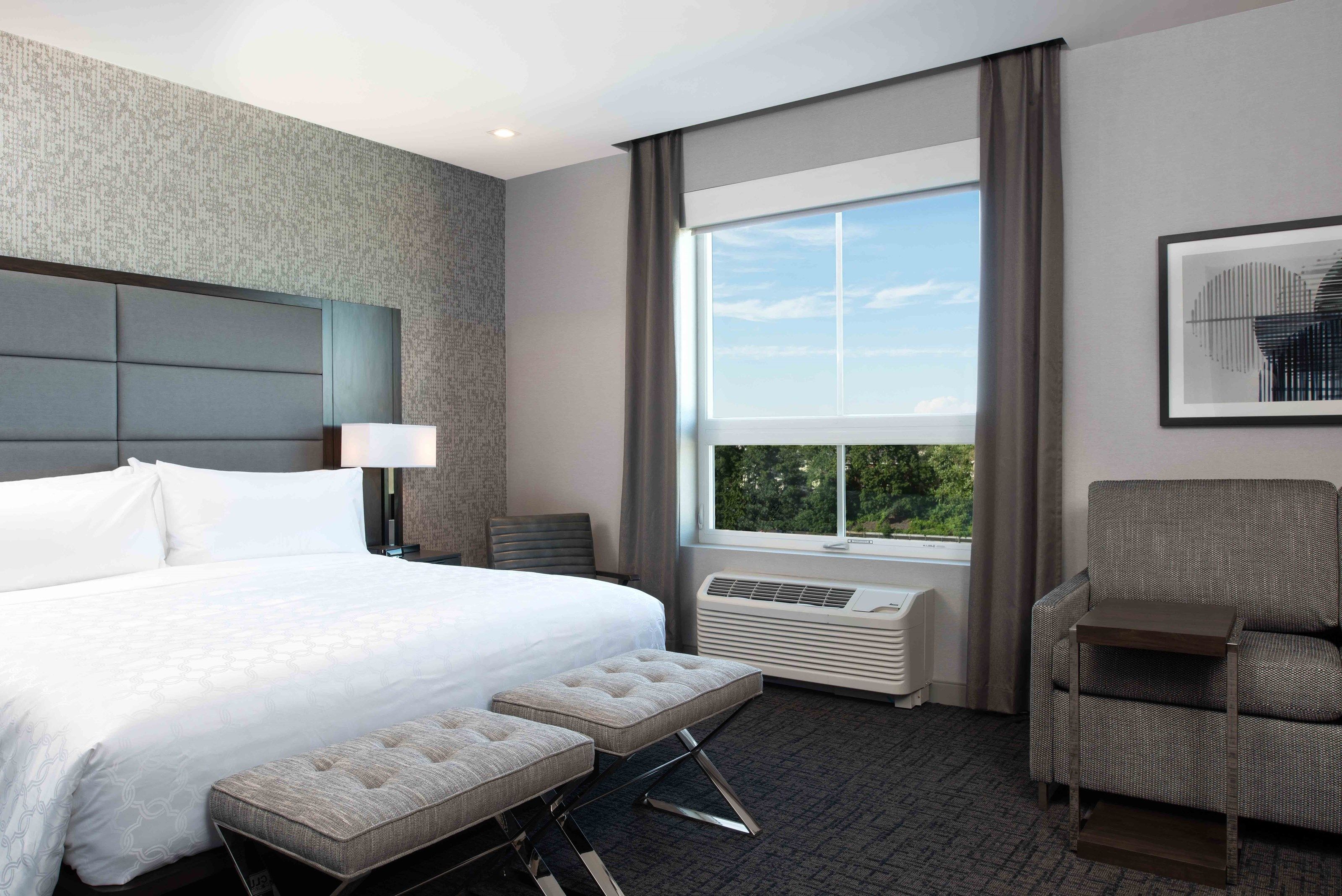 image Drift to sleep in a comfortable bed after a wonderful day outside.