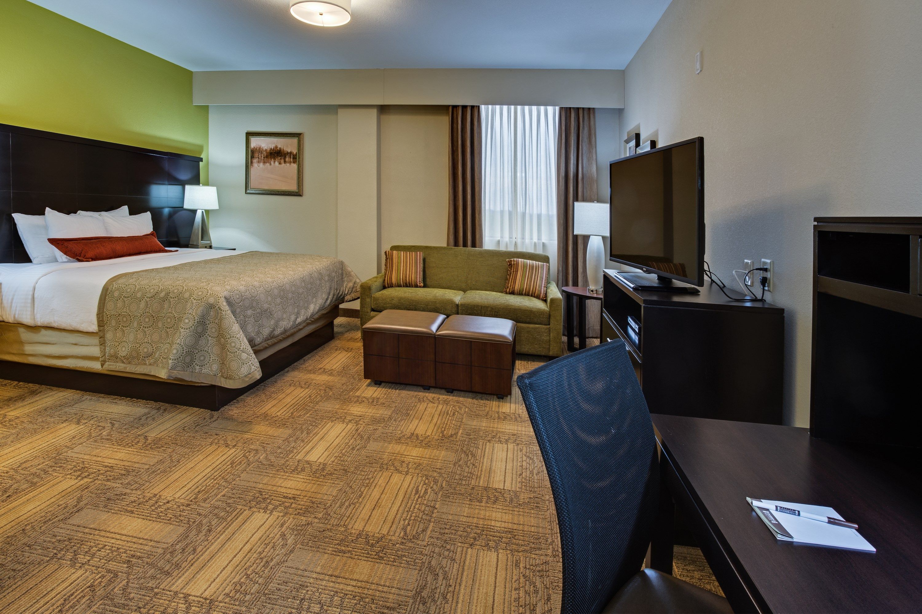 image Drift to sleep in a comfortable bed after a wonderful day outside.