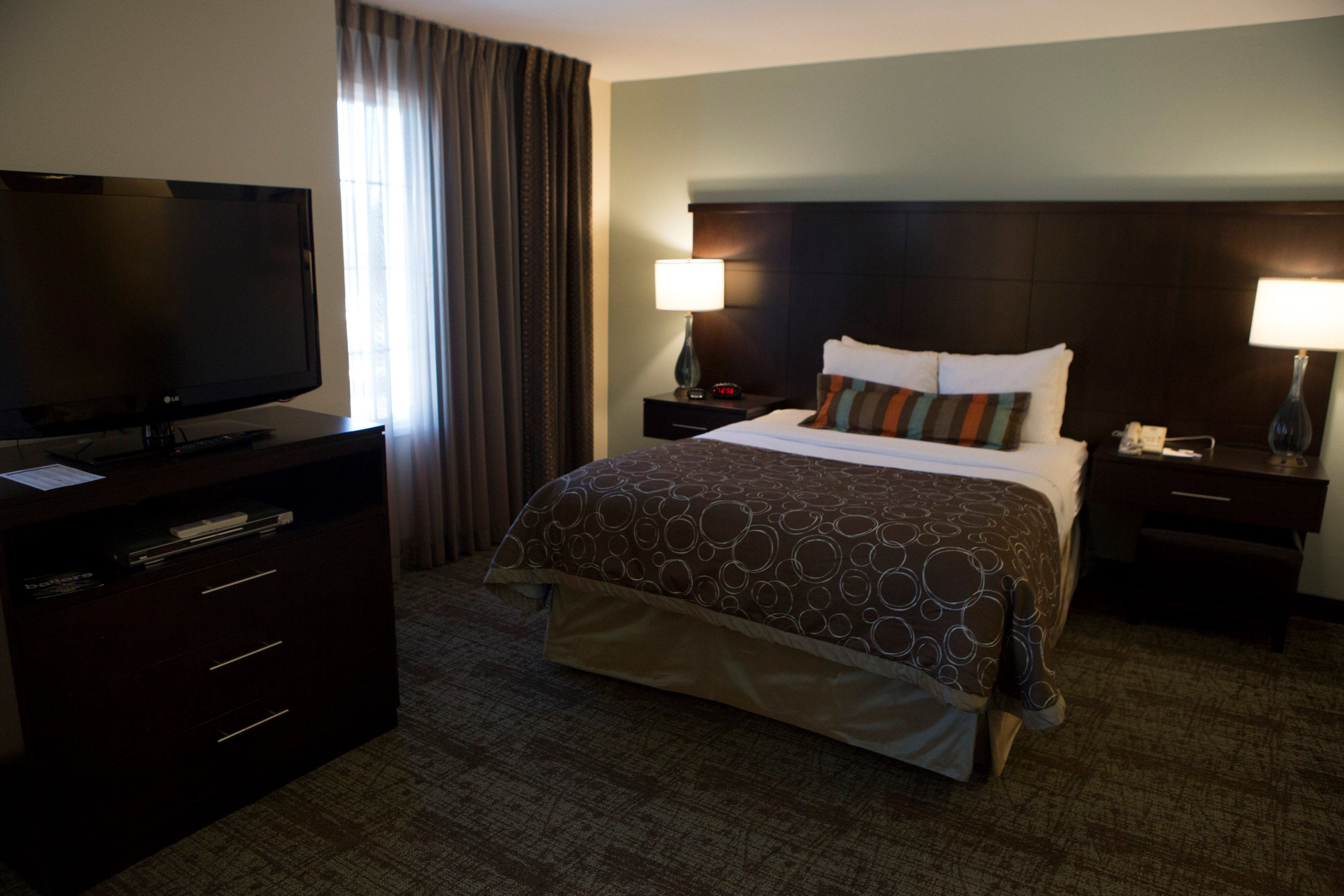 image Drift to sleep in a comfortable bed after a wonderful day outside.