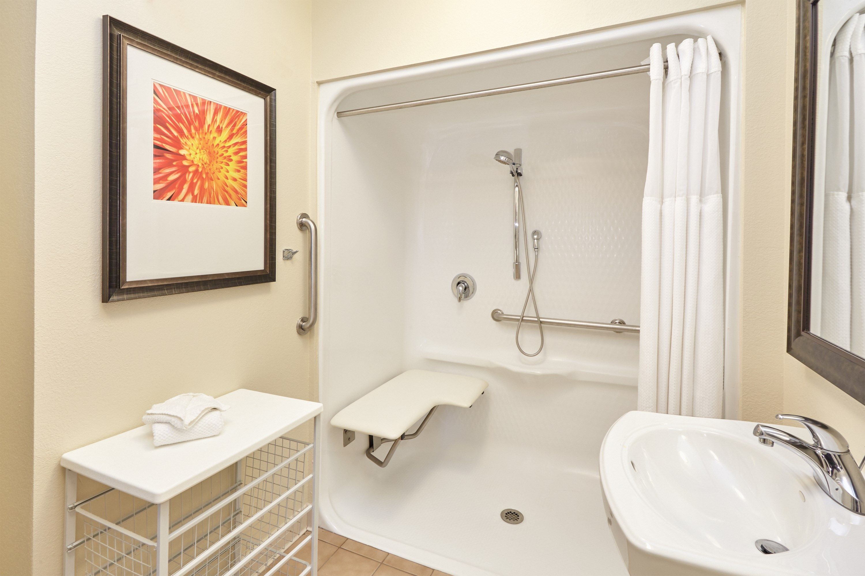 image There is a roll-in shower in this accessible unit.