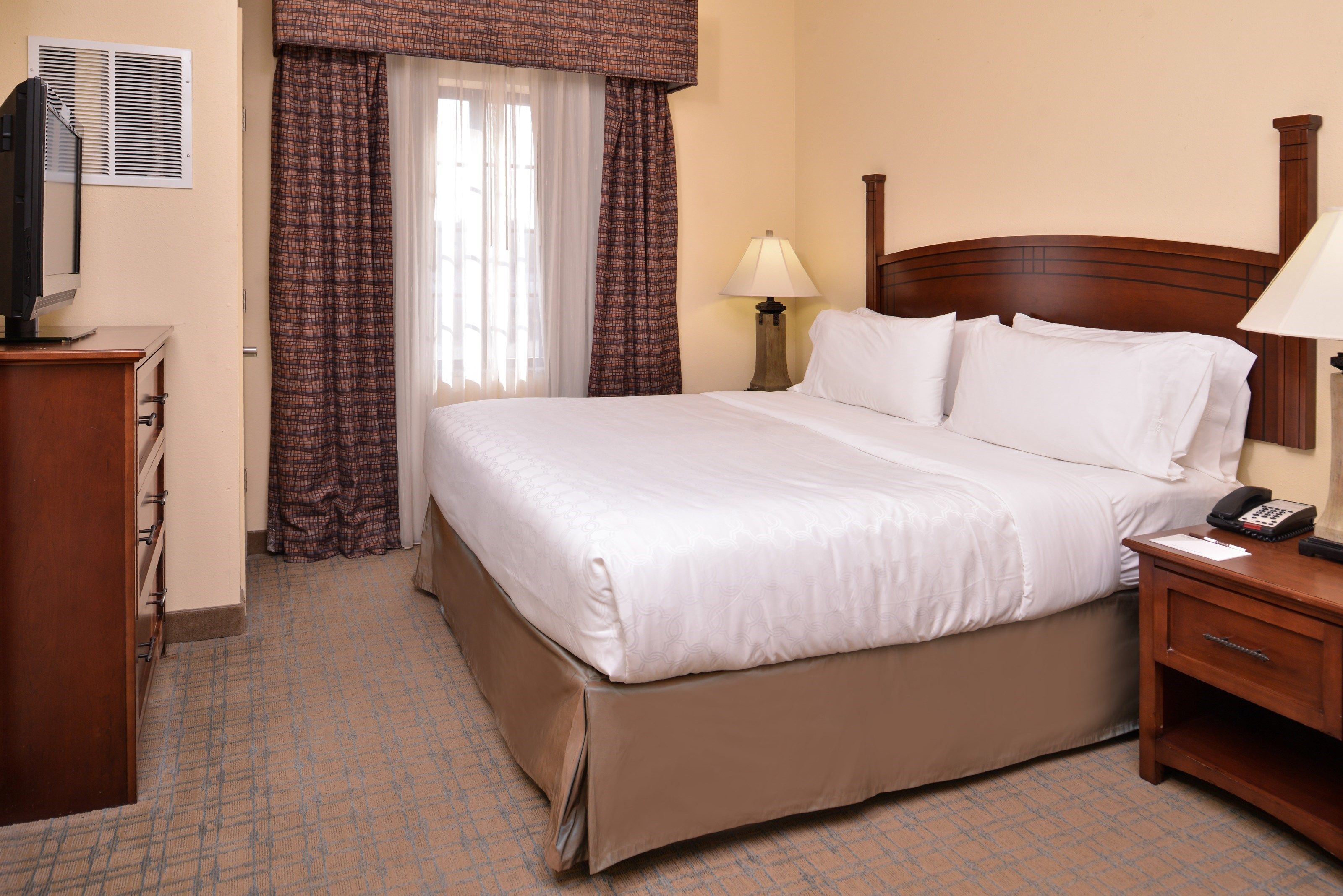 image Drift to sleep in a comfortable bed after a wonderful day outside.