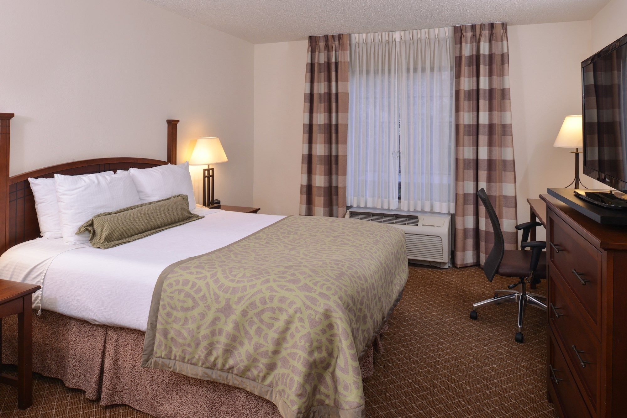 image Drift to sleep in a comfortable bed after a wonderful day outside.