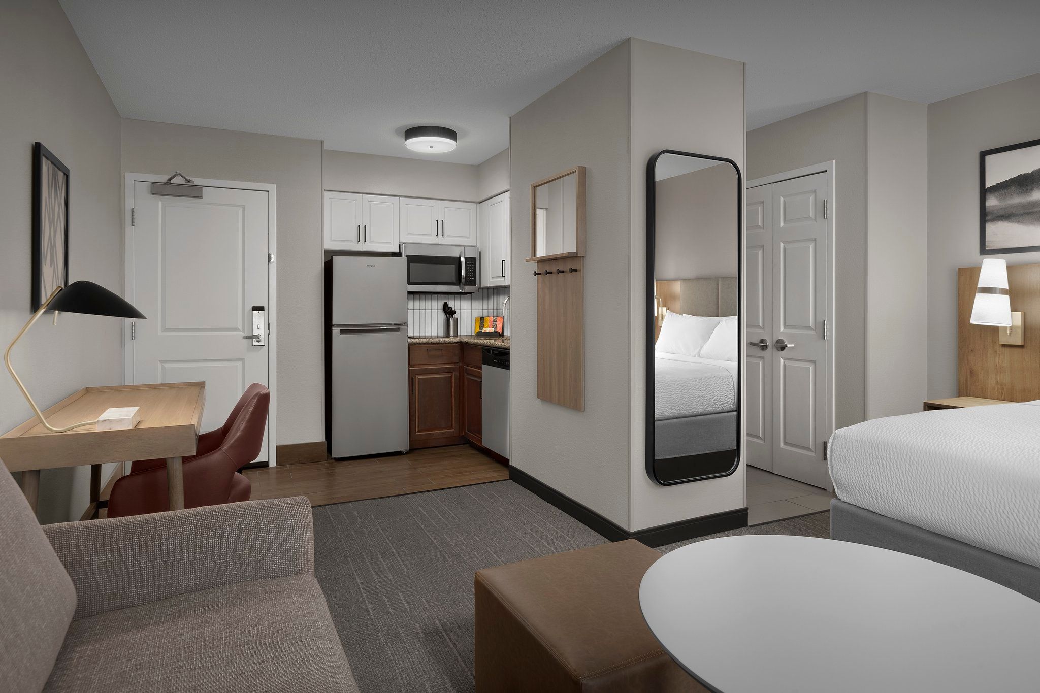 image Relax in this cozy living space, where comfort meets convenience in every corner.