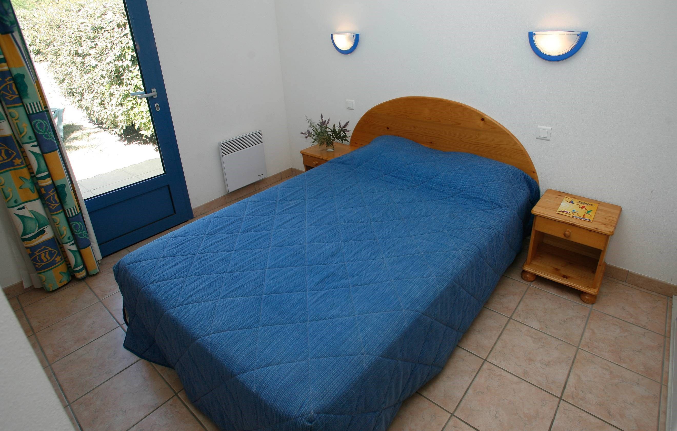 image The master bedroom features a cozy Double bed.