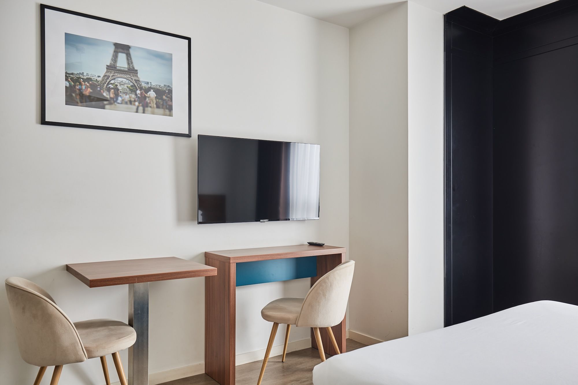 image The contemporary furnishings and vibrant color accents create an appealing atmosphere in this comfortable space tailored for short or extended stays.