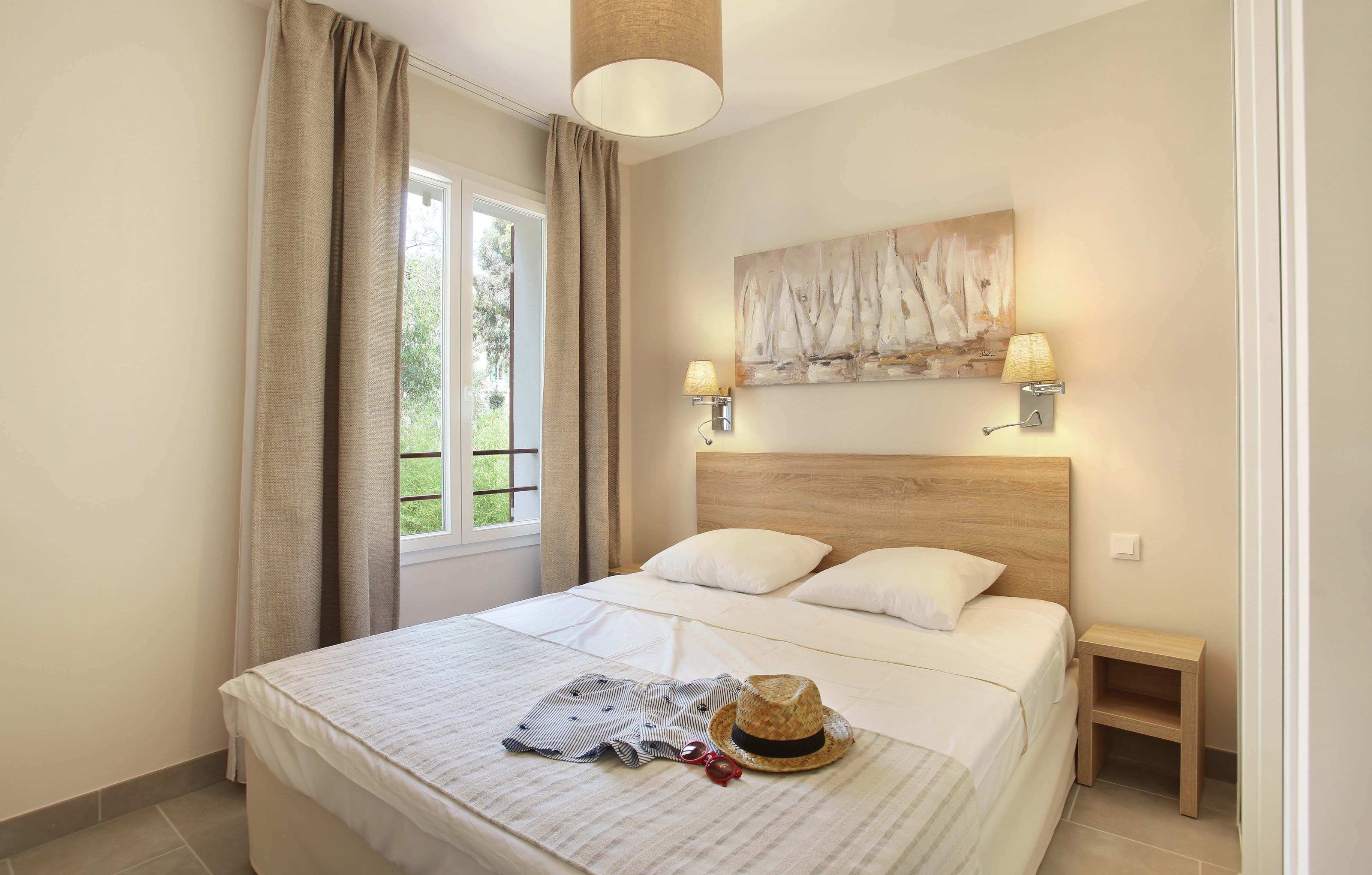 image Drift to sleep in a comfortable bed after a wonderful day outside.
