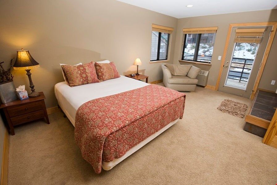 image The master bedroom features access to the private balcony