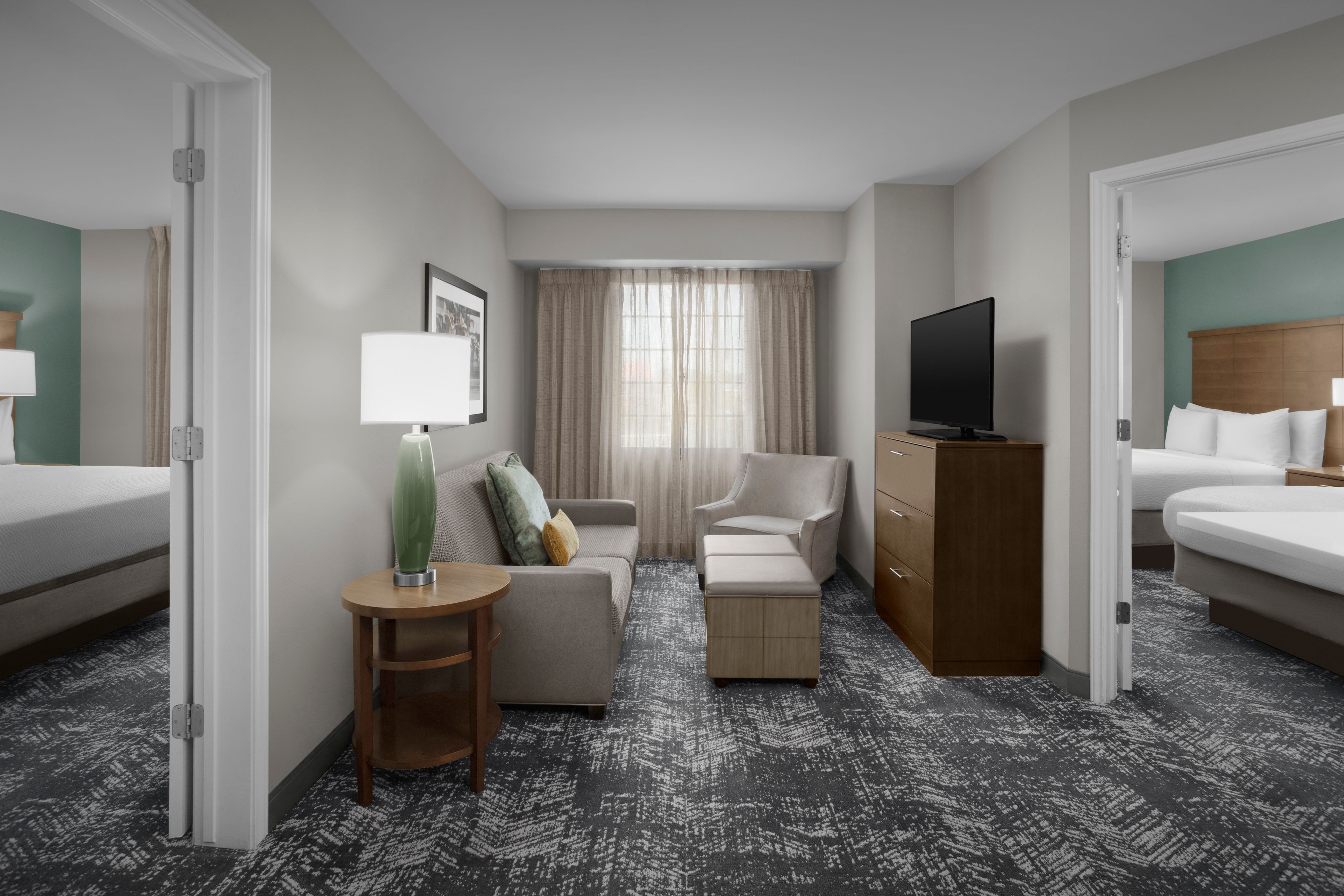 image Spacious living area with comfortable seating and natural light.