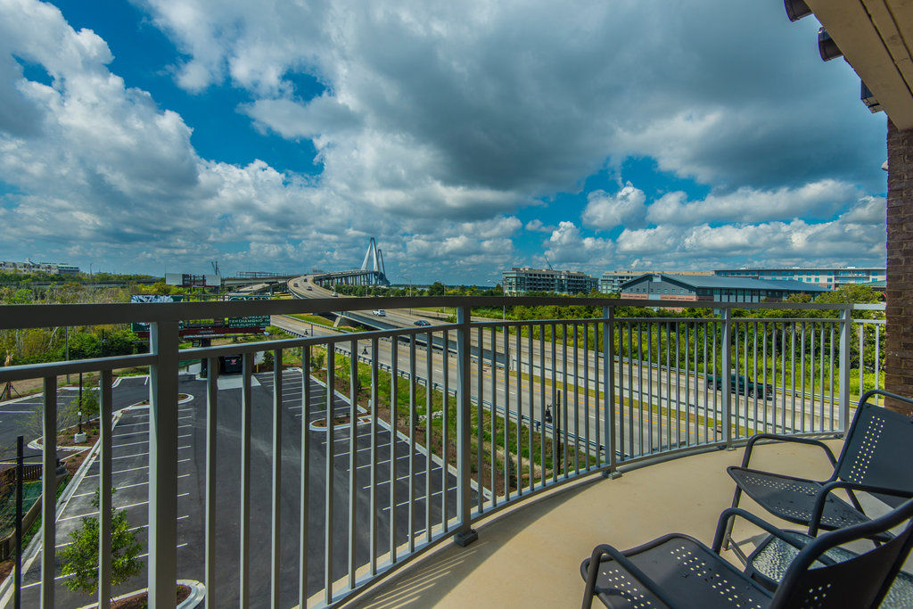 image Private balcony with outdoor seating and city views.