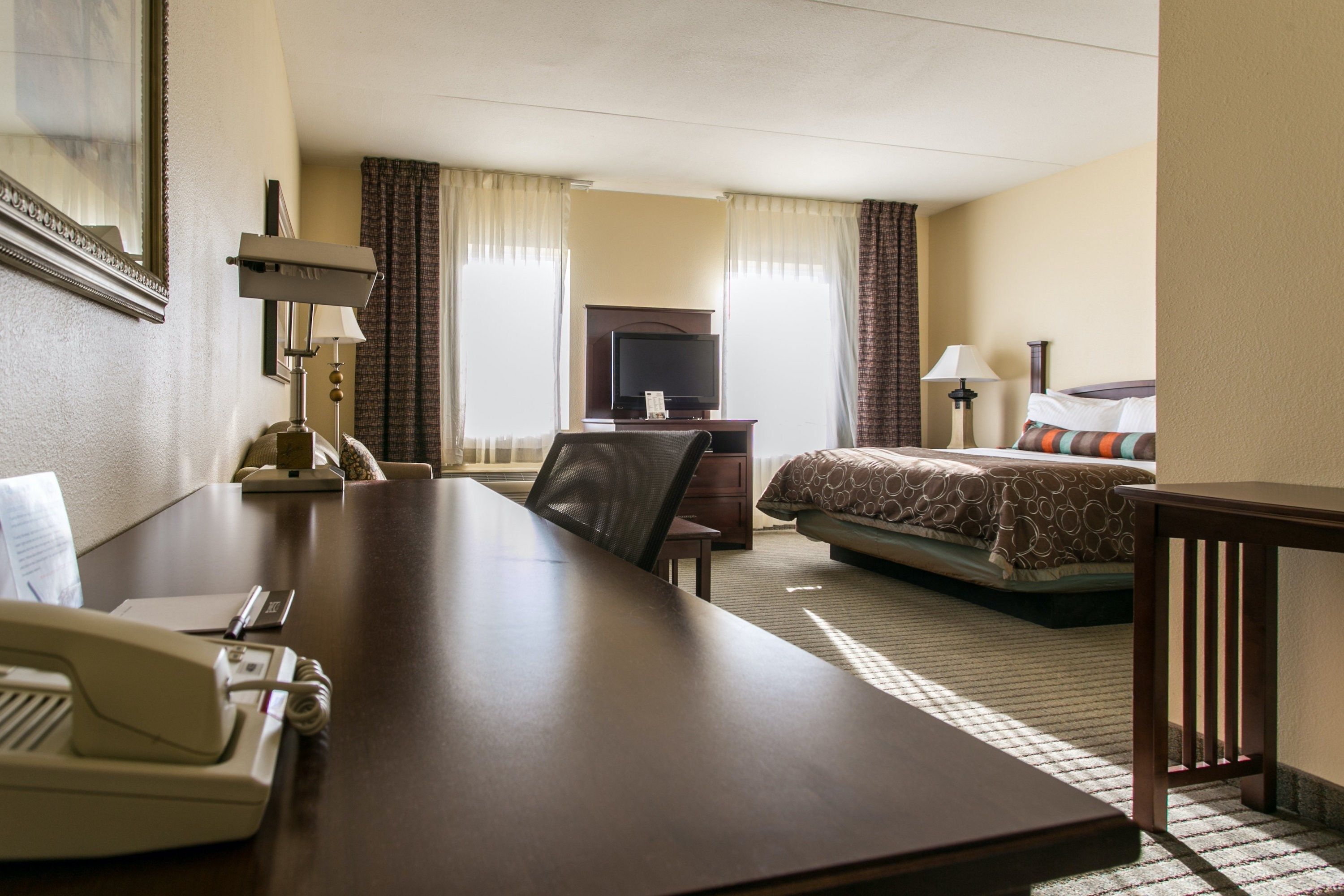 image Drift to sleep in a comfortable bed after a wonderful day outside.