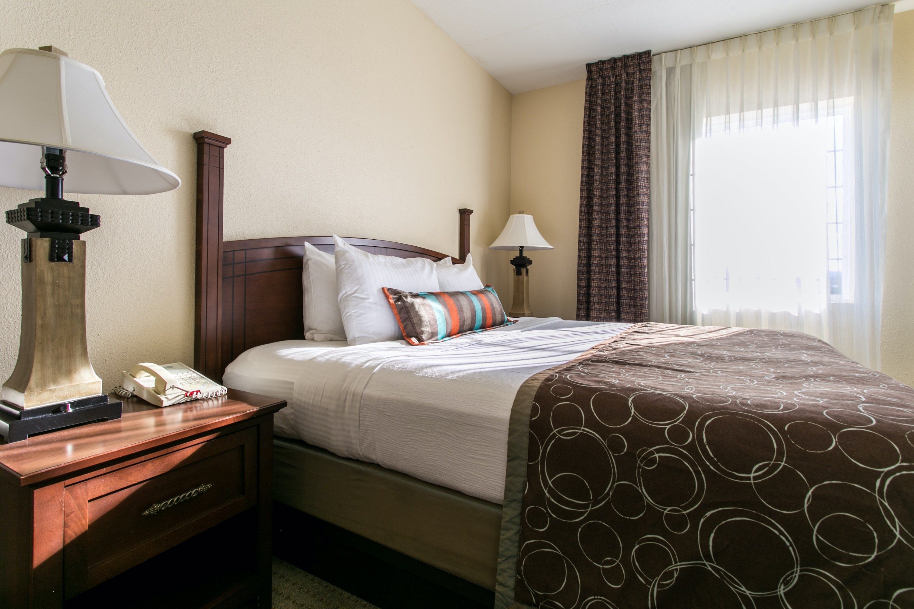 image Drift to sleep in a comfortable bed after a wonderful day outside.