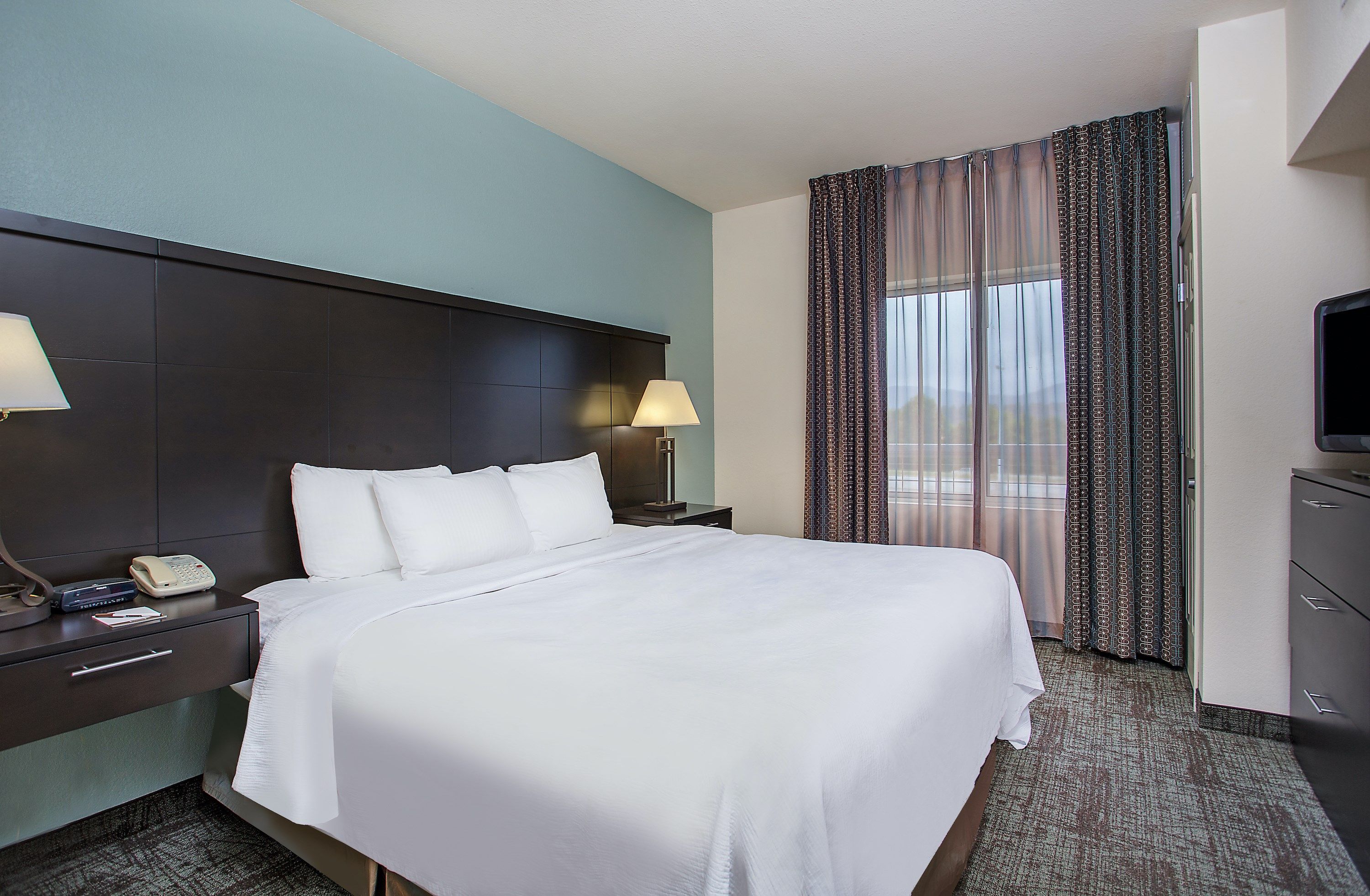 image Drift to sleep in a comfortable bed after a wonderful day outside.