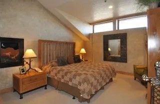 image Get a good night's sleep in the master bedroom.