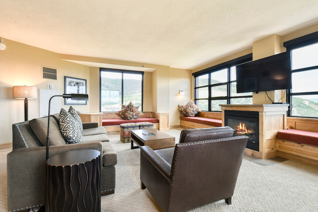 image Take a seat in front of the fireplace and enjoy a movie in the living area.