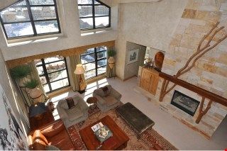 image Enjoy vaulted ceilings and beautiful floor to ceiling windows with mountain views