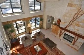 image Enjoy vaulted ceilings and beautiful floor to ceiling windows with mountain views