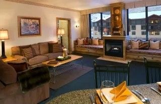 image Relax and unwind in the cozy, well-appointed living room.