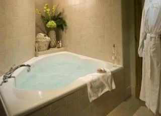 image Soak sore muscles in the luxurious soaker tub after a long day on the mountain.