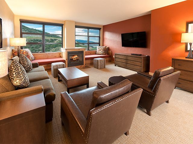 image Relax and unwind in the cozy, well-appointed living room.